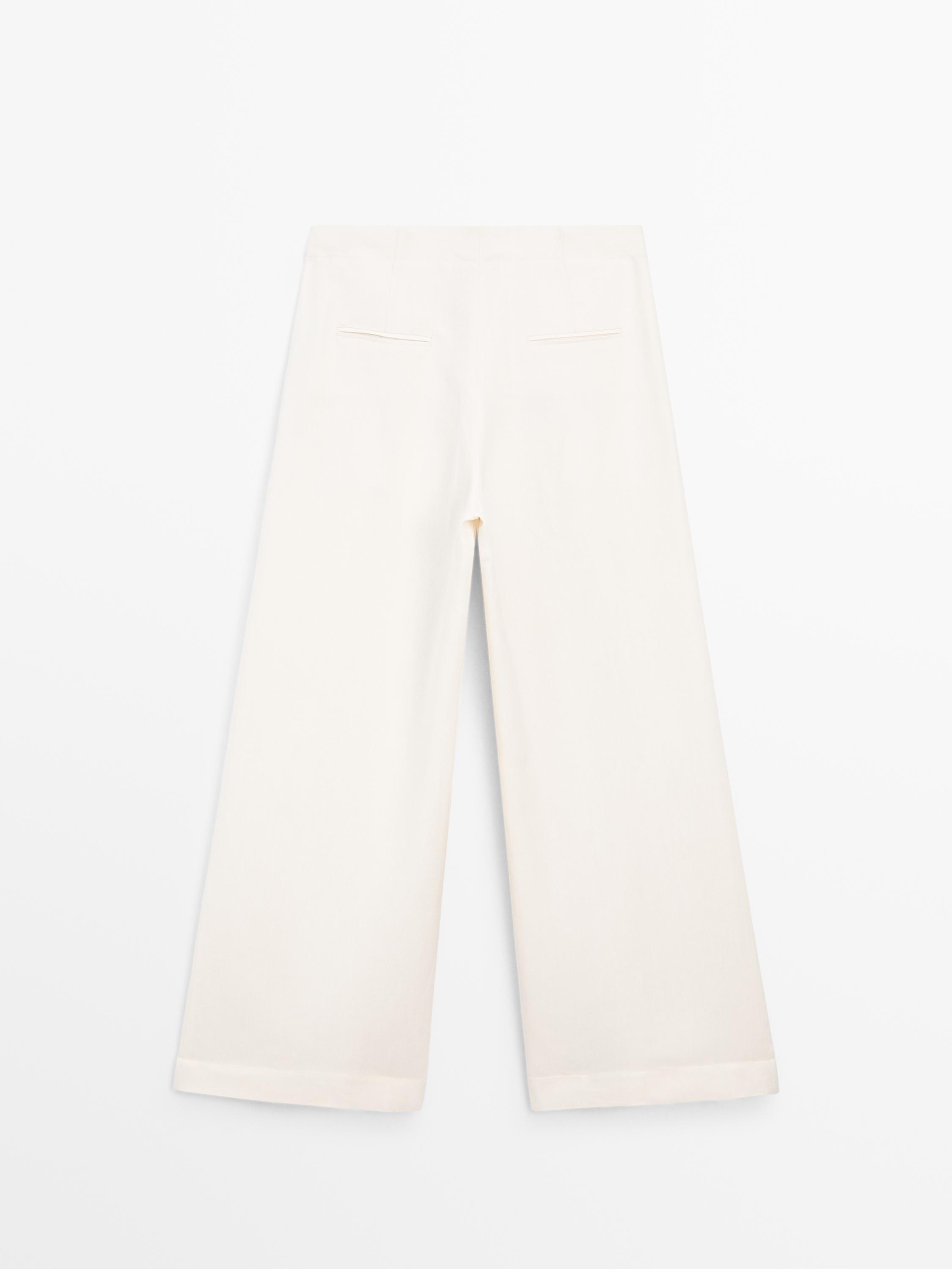 Suit trousers in contrasting fabric