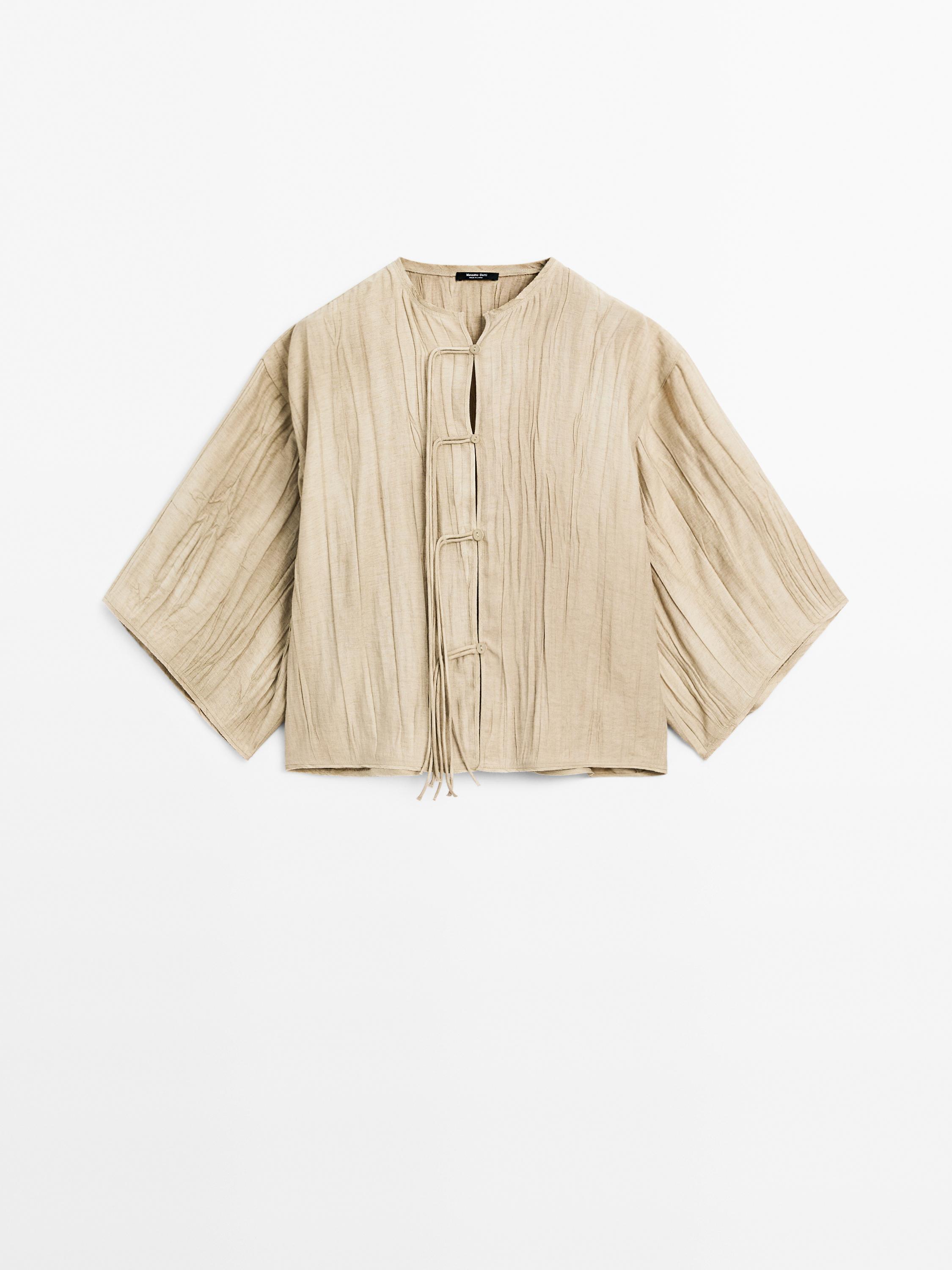 Soepelvallende kimono met strik