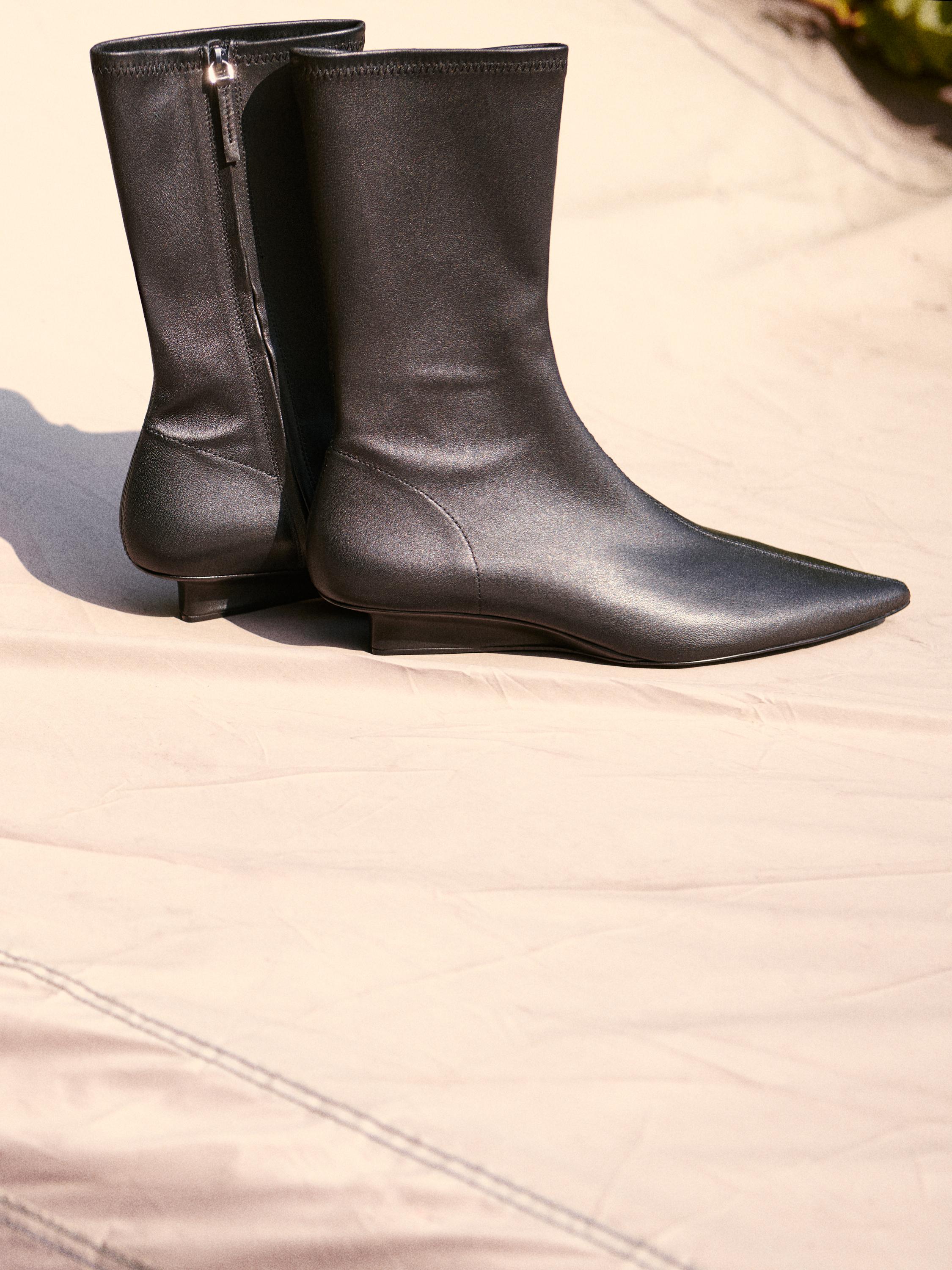 Stretch leather wedge ankle boots