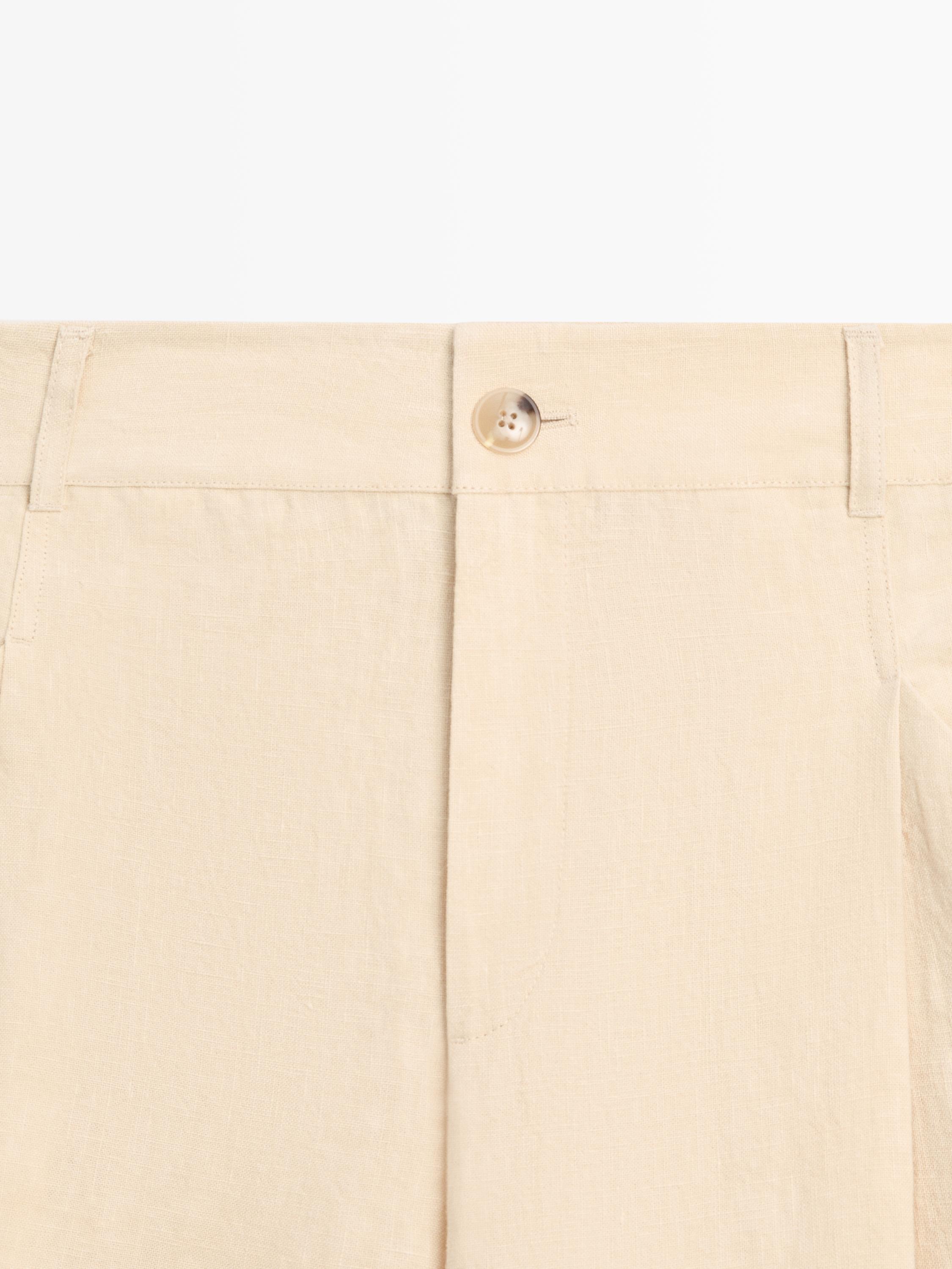 Wide-leg linen trousers with pocket detail — SAND