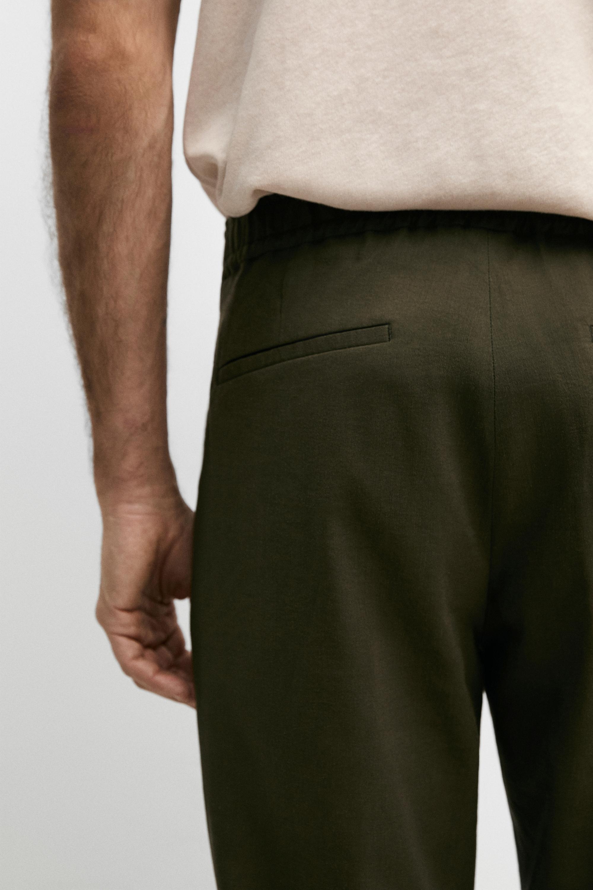 Total look darted jogger fit trousers — GREEN