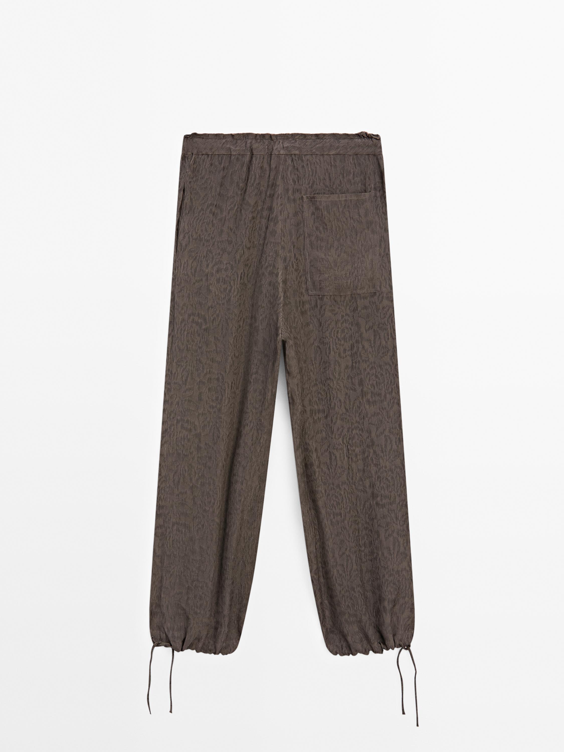 Flowing wide-leg jacquard trousers