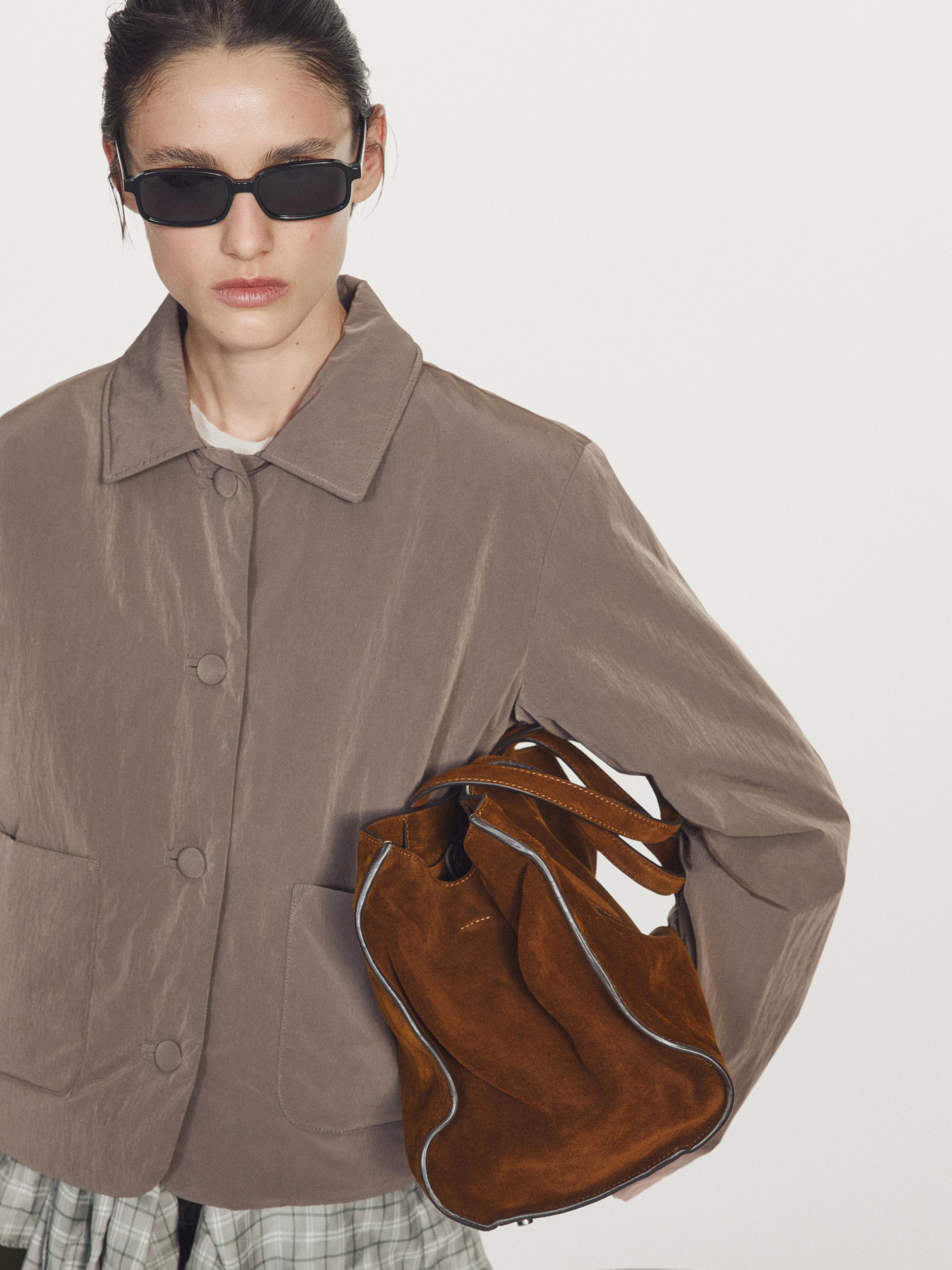 Короткая непромокаемая стеганая куртка