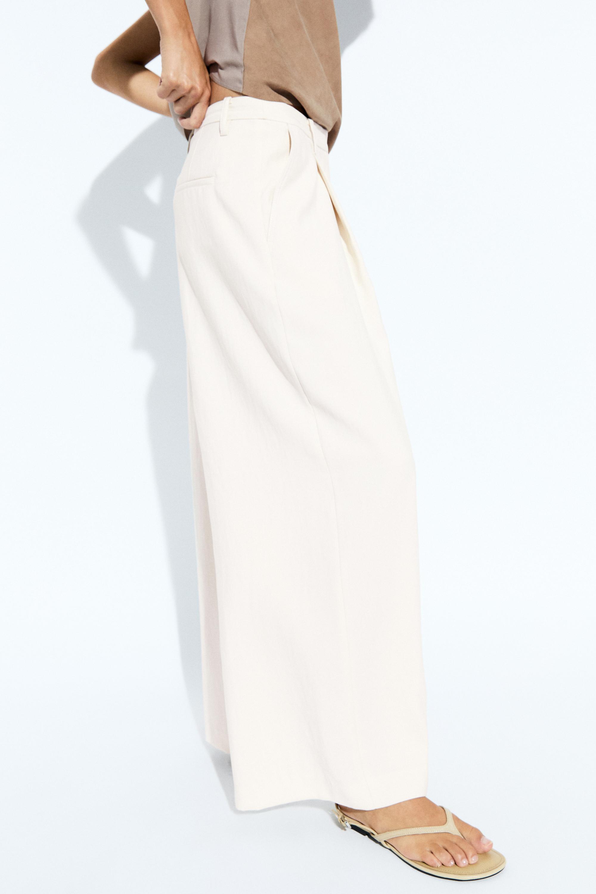Flowing cropped wide-leg pants — CREAM