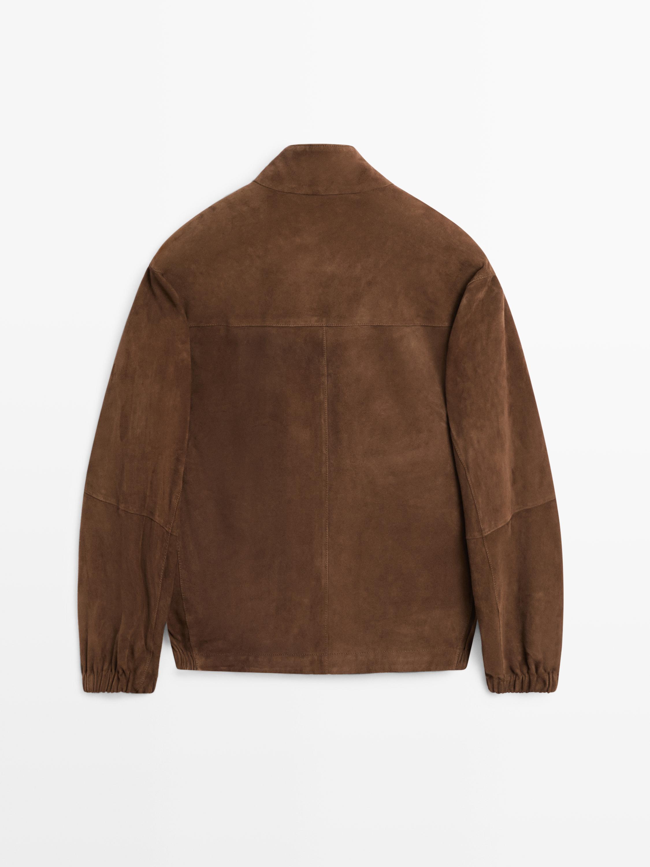 Rear view of a tobacco-colored bomber jacket with a high collar and long sleeves.