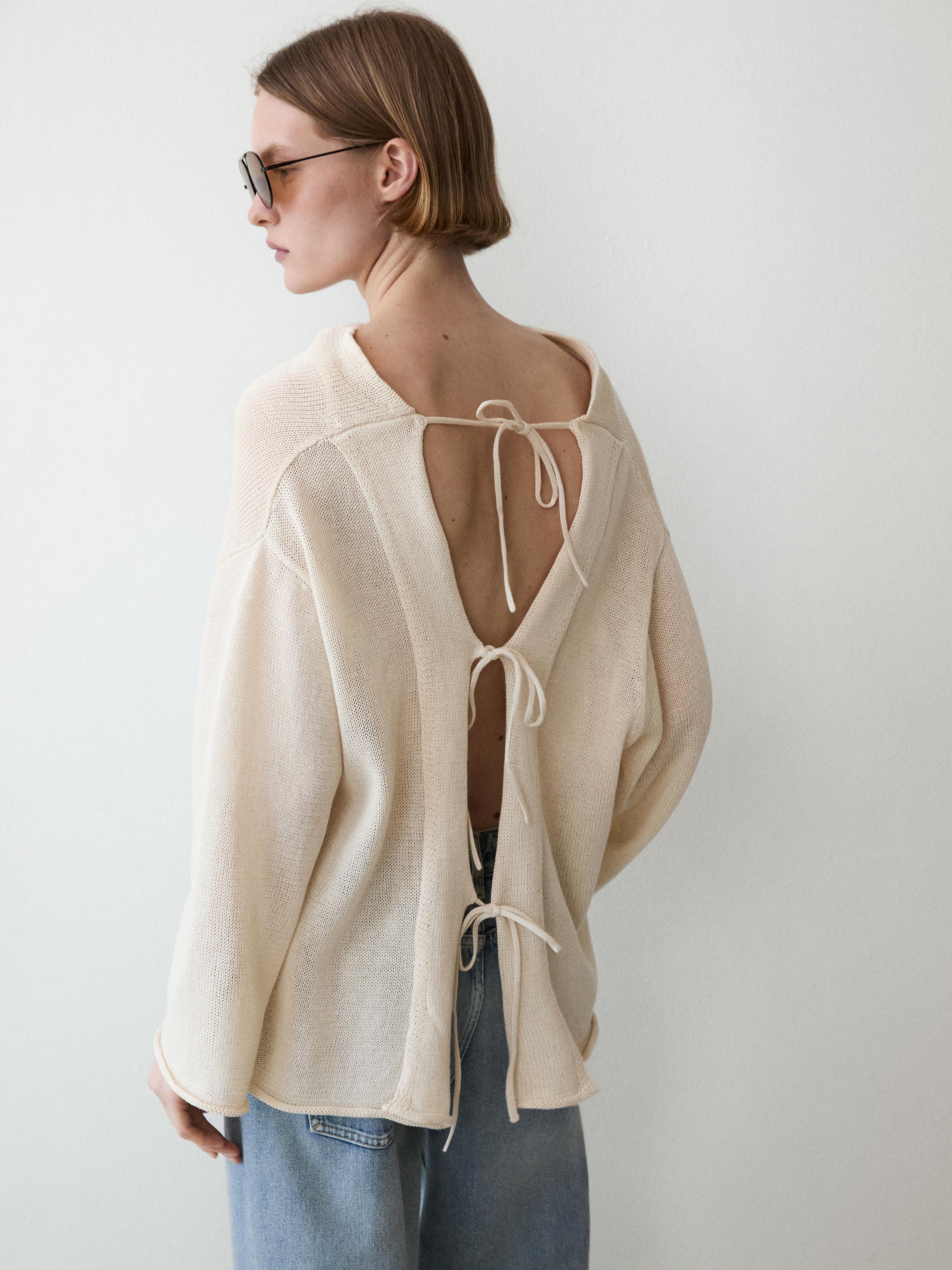 100% cotton jumper with a lace-up back