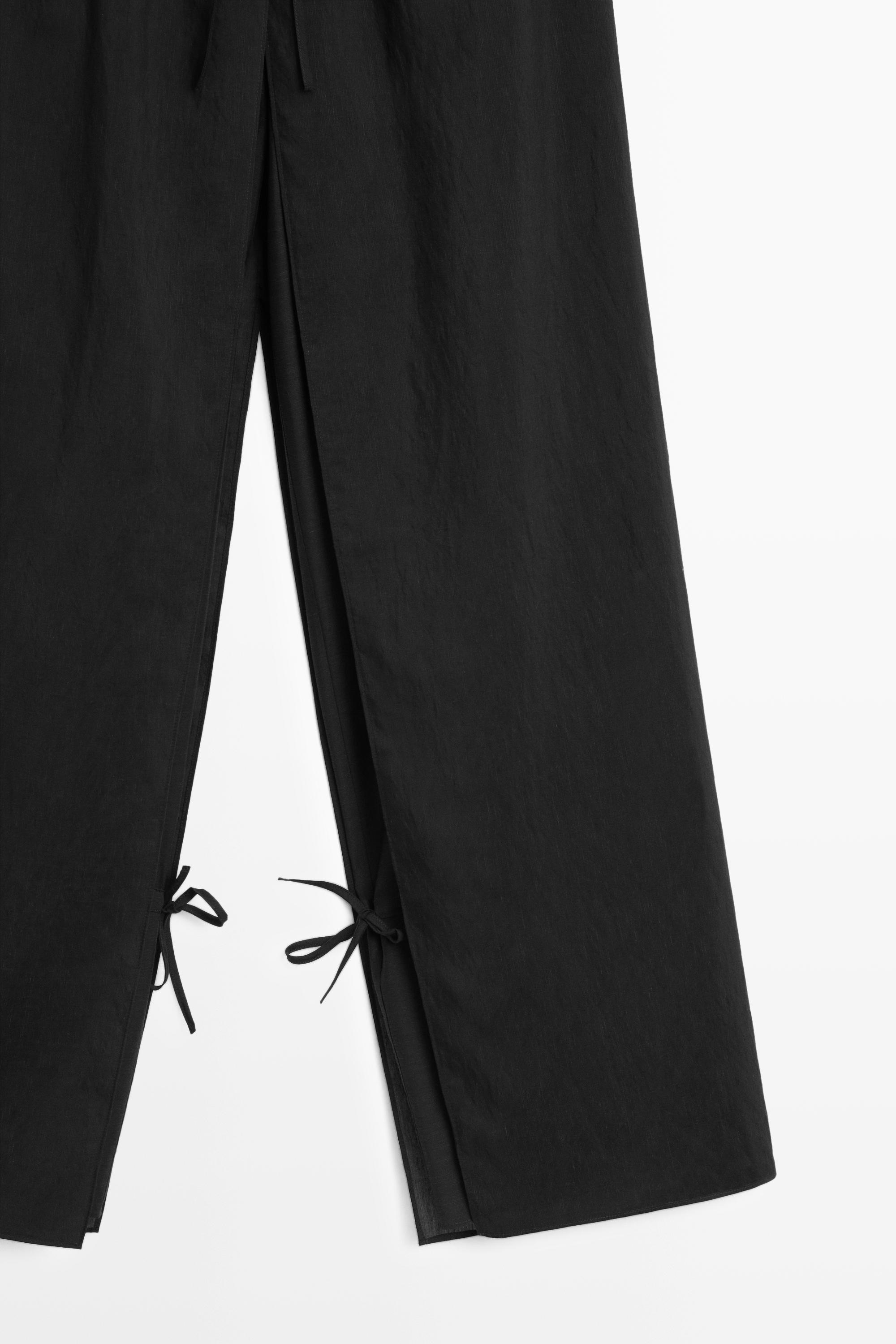 Double-layer pants with tie detail — BLACK