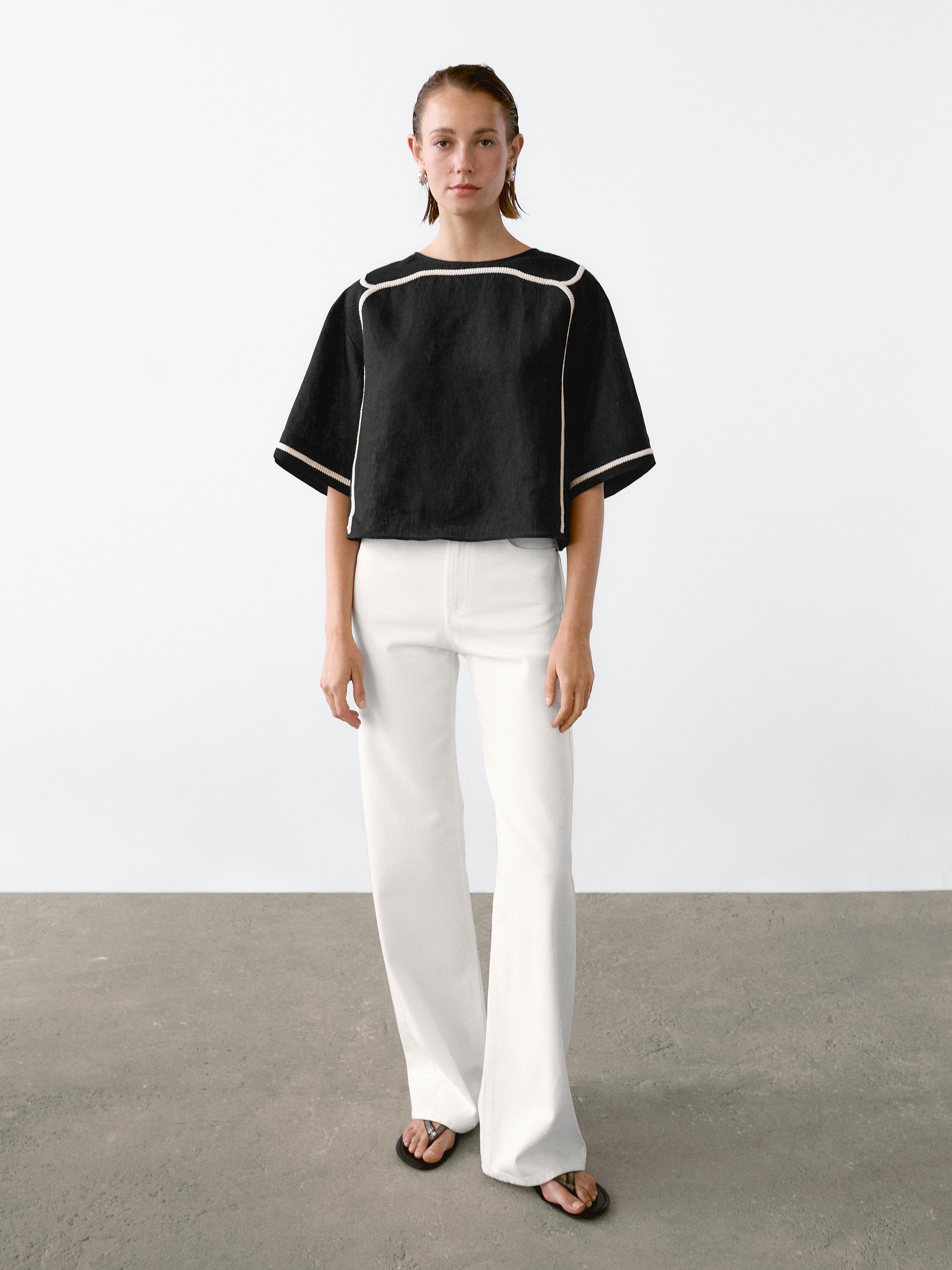 Blouse with contrast embroidery