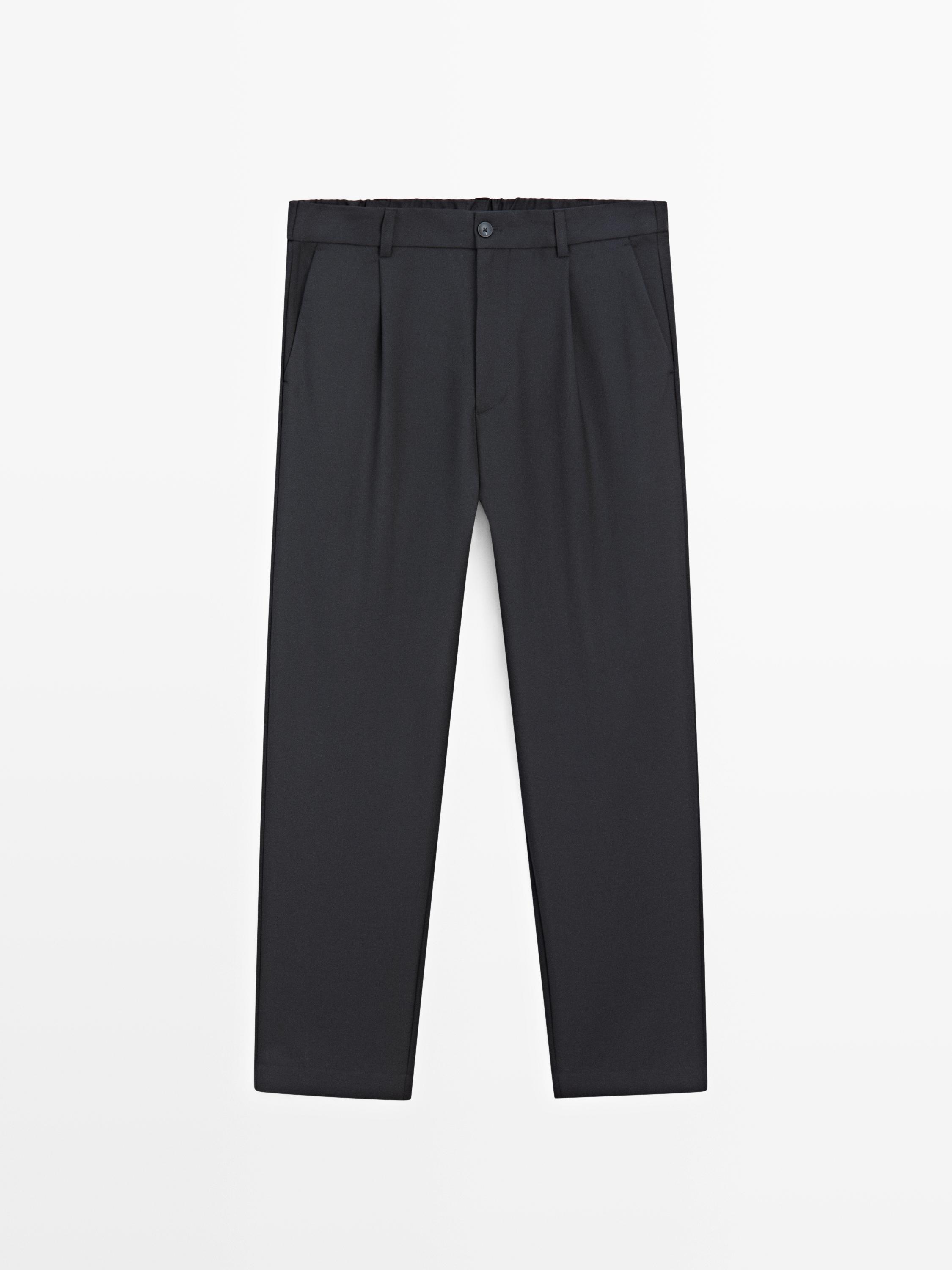 Relaxed fit darted wool blend trousers