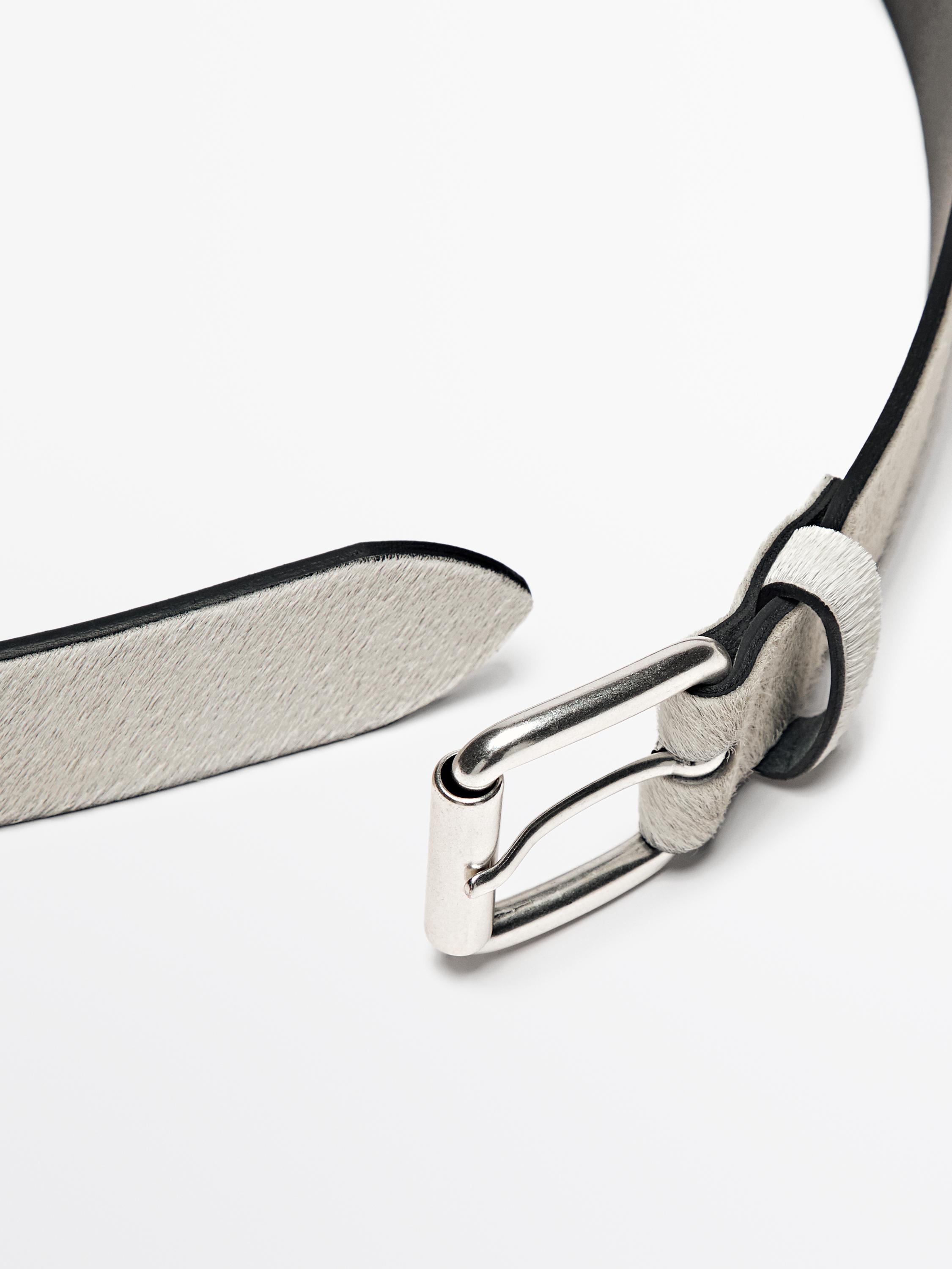 Hair on leather belt