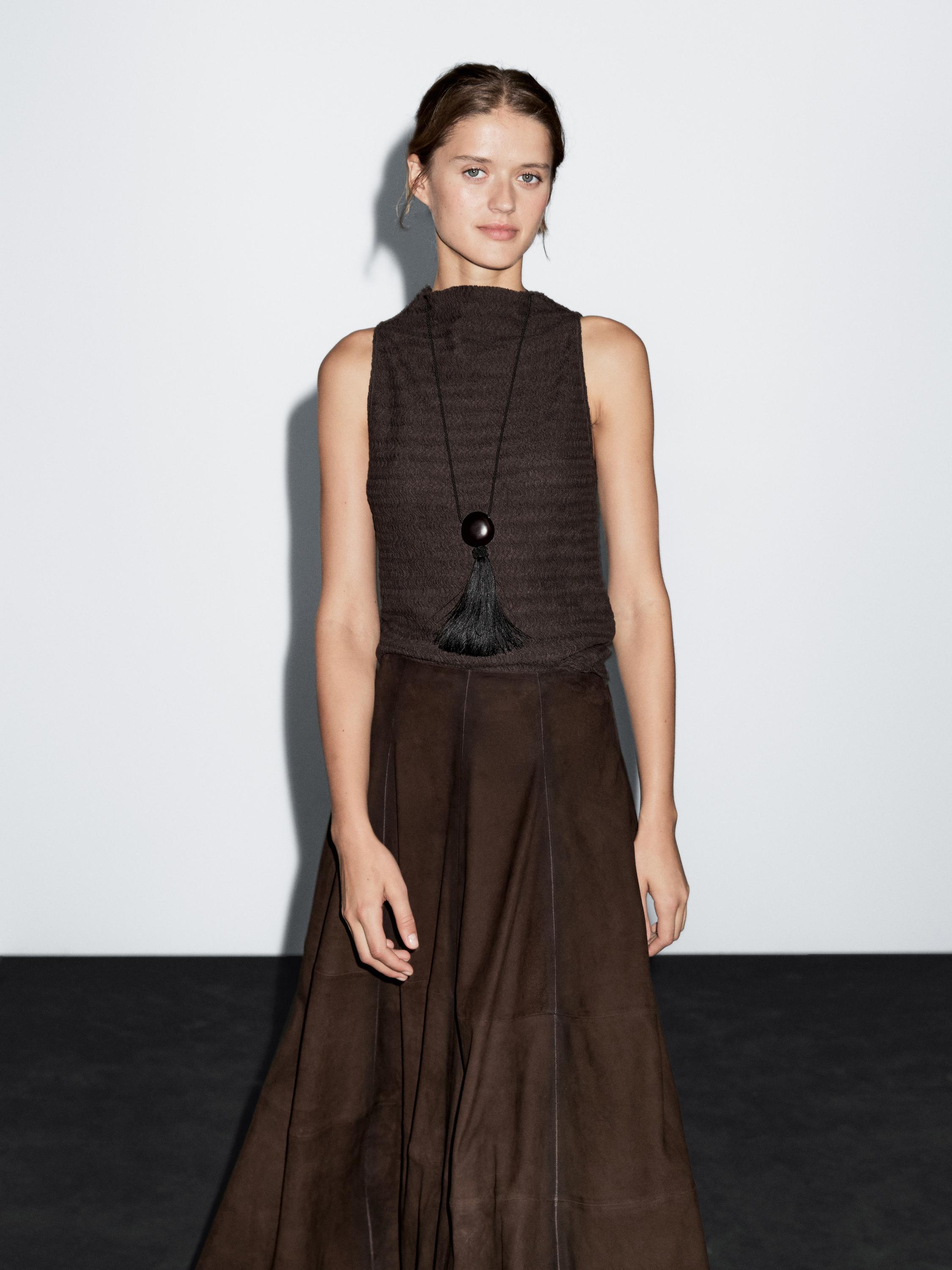 Chocolate linear waffle-knit funnel neck top