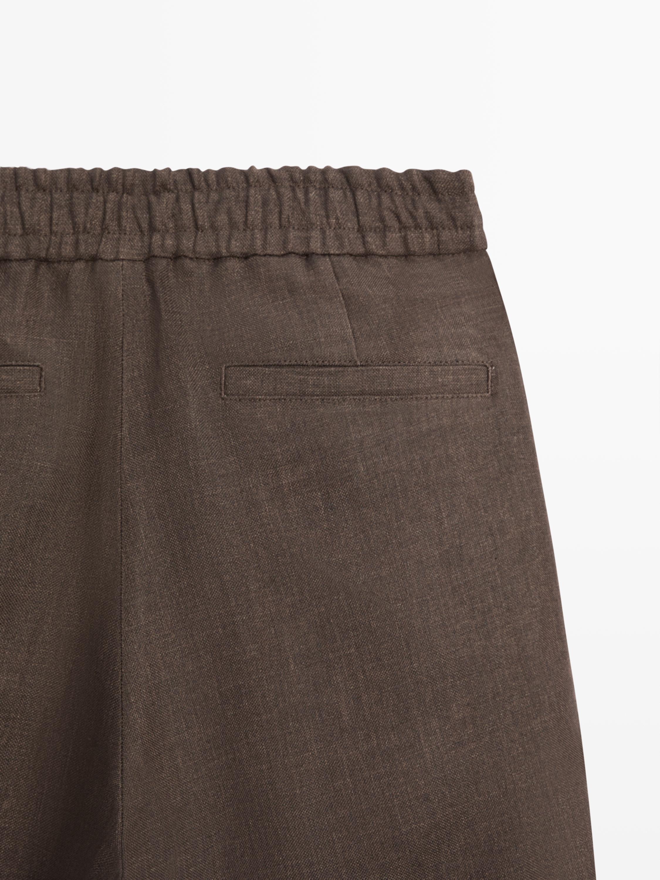 Faded total look linen trousers — OCHRE