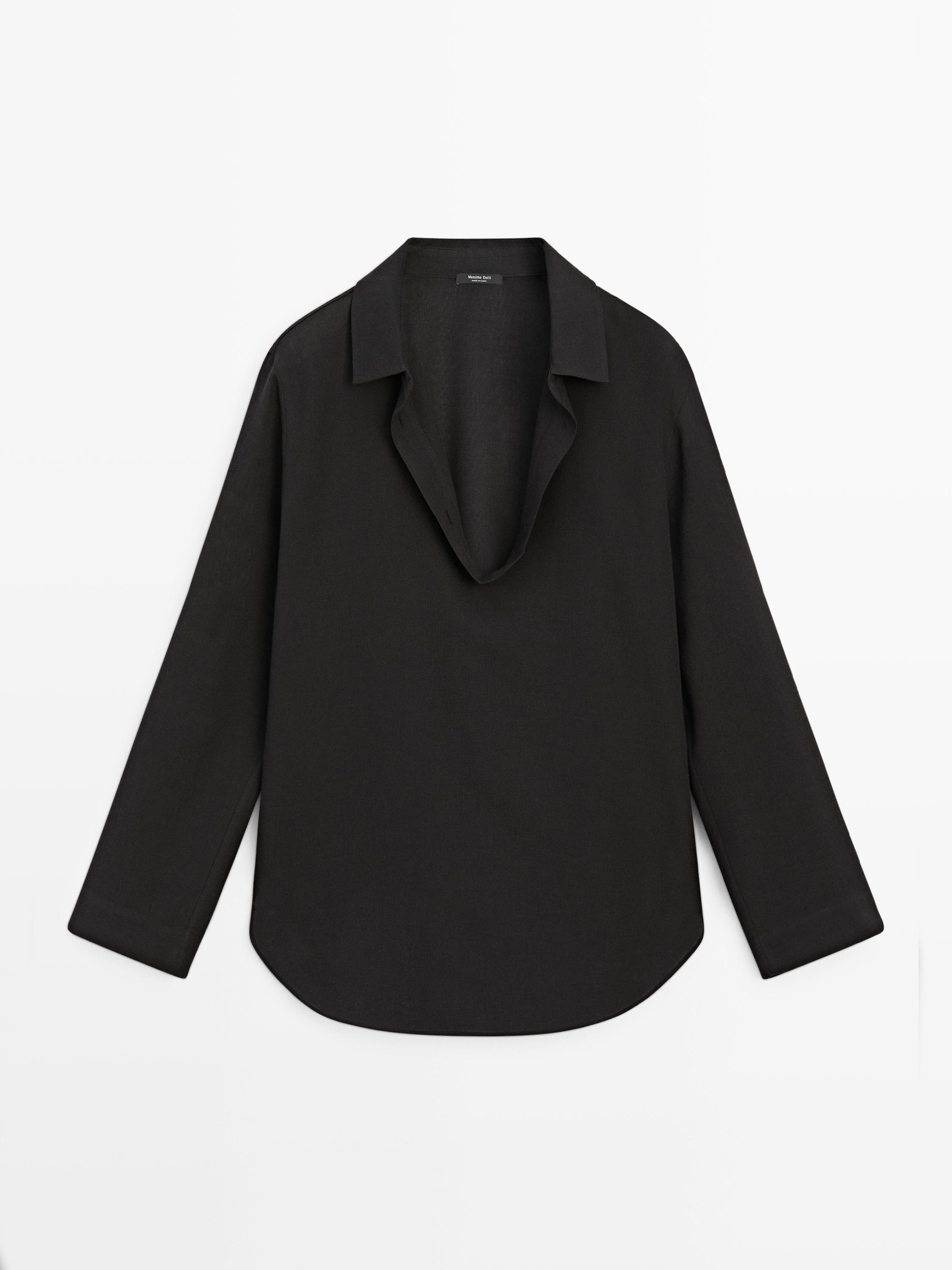 Front view of a flowing brown shirt with a V-neck and long sleeves.