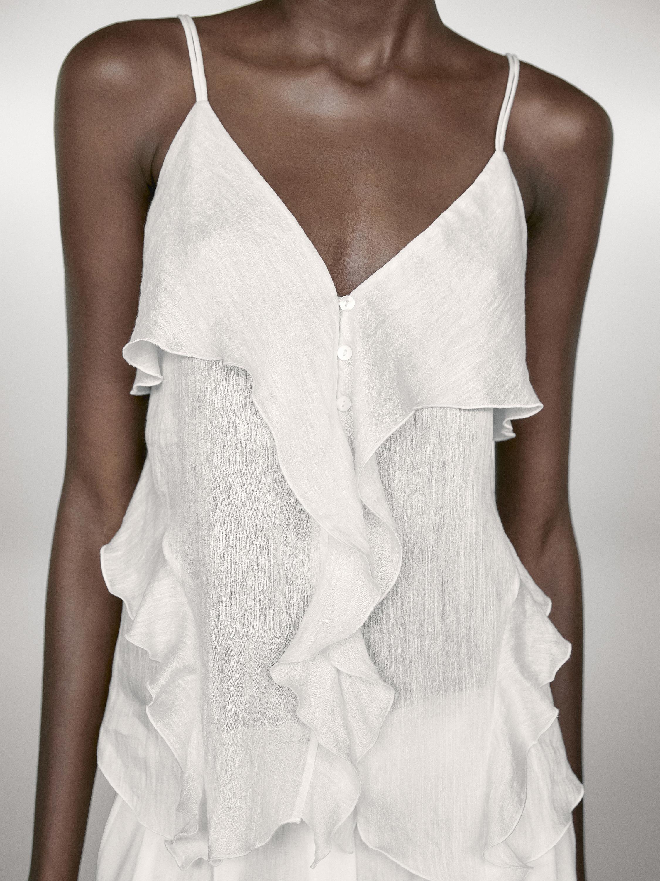 Top sa bretelama i karnerom