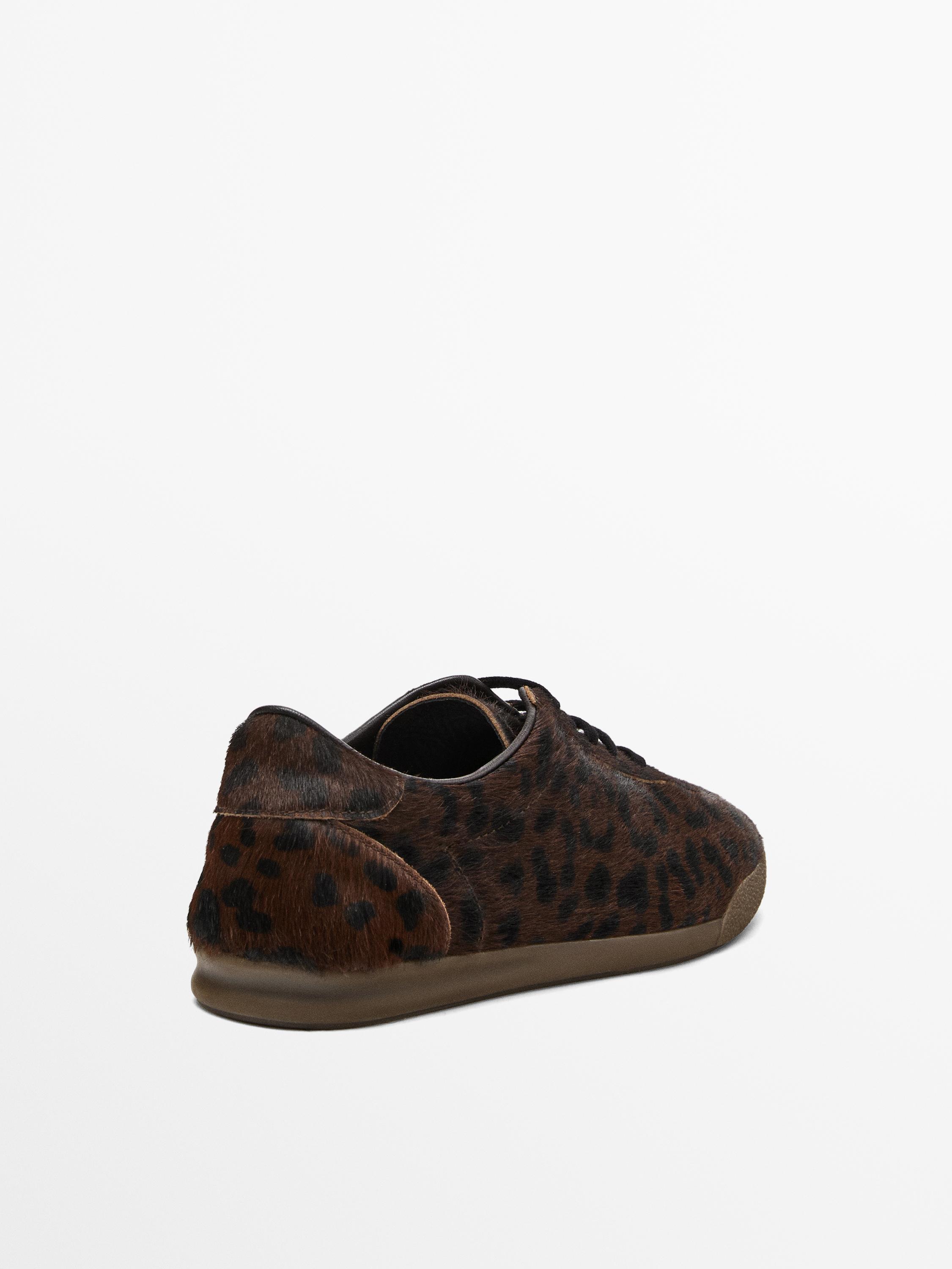 Animal print faux fur trainers