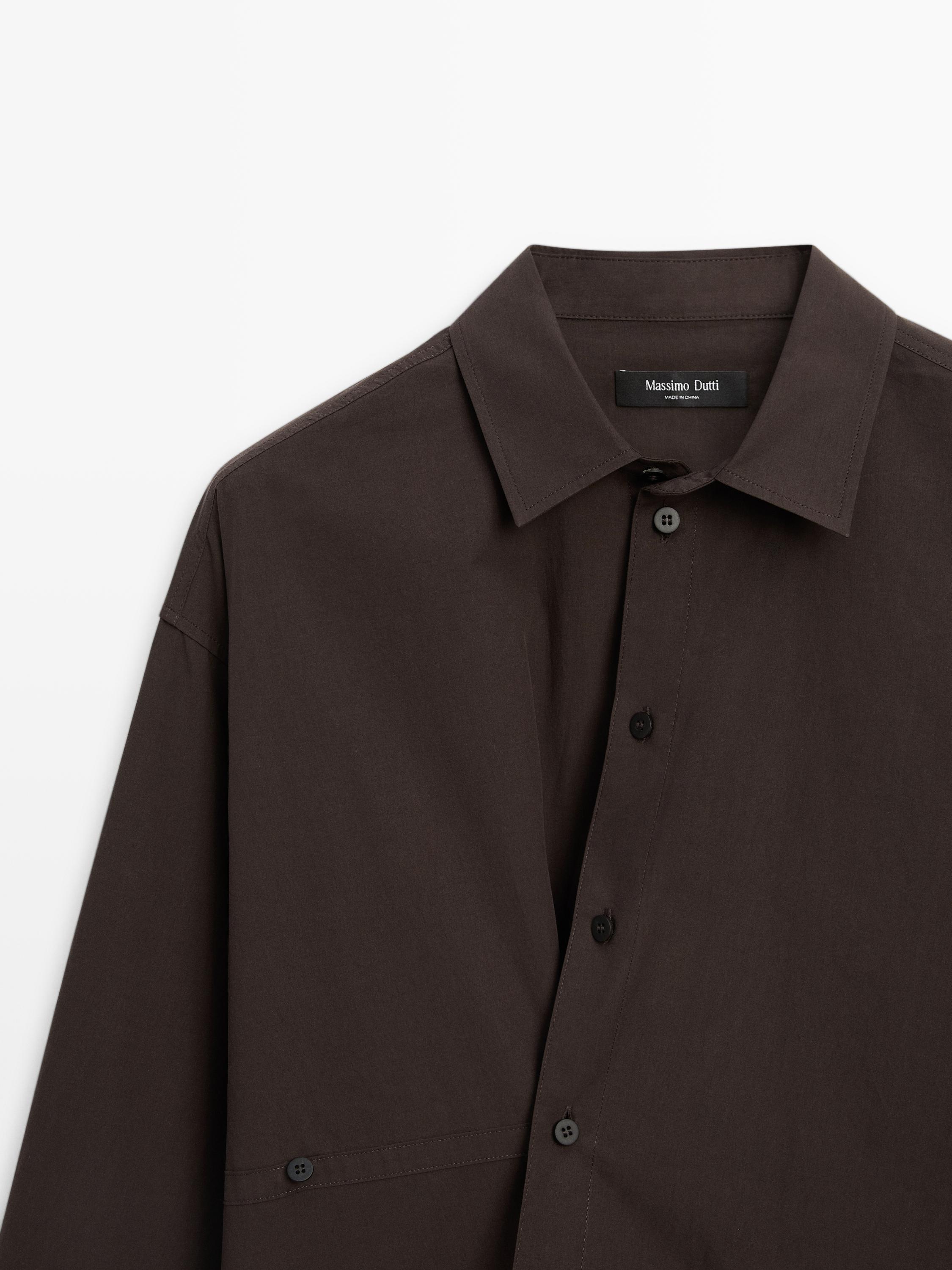 Camisa popelín botonadura asimétrica