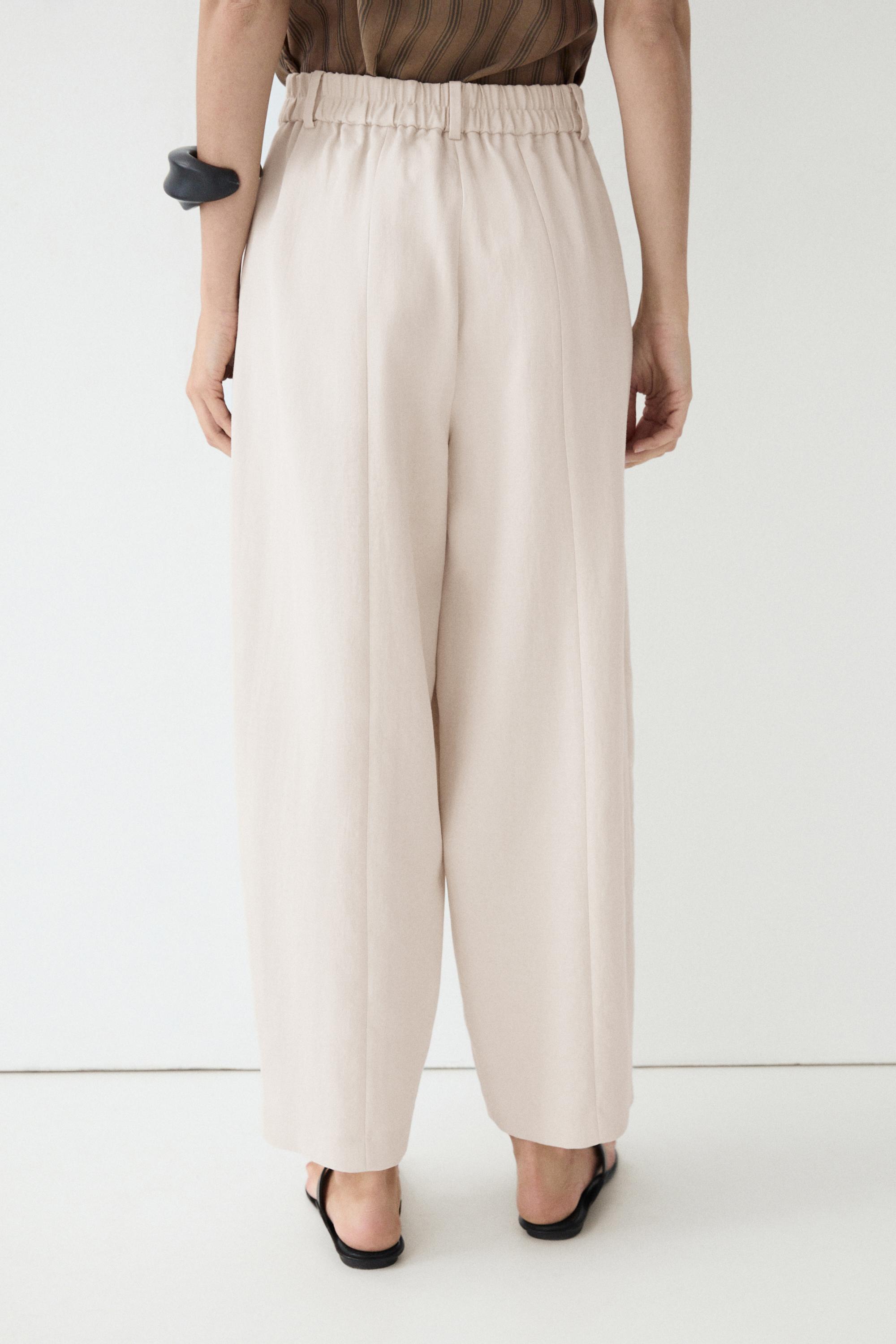 Flowing pants with elasticated waistband — CREAM