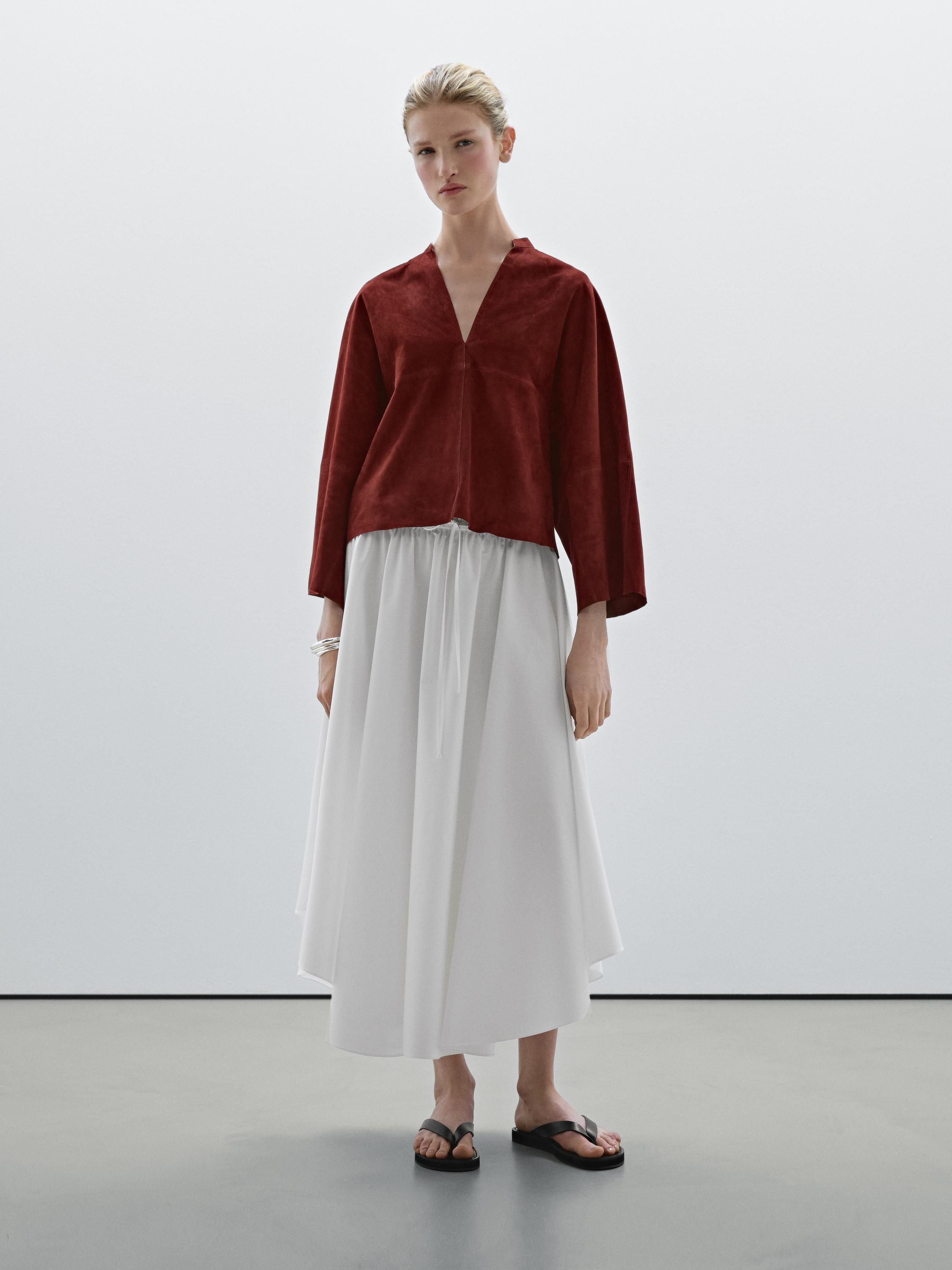 Flowing asymmetric midi skirt