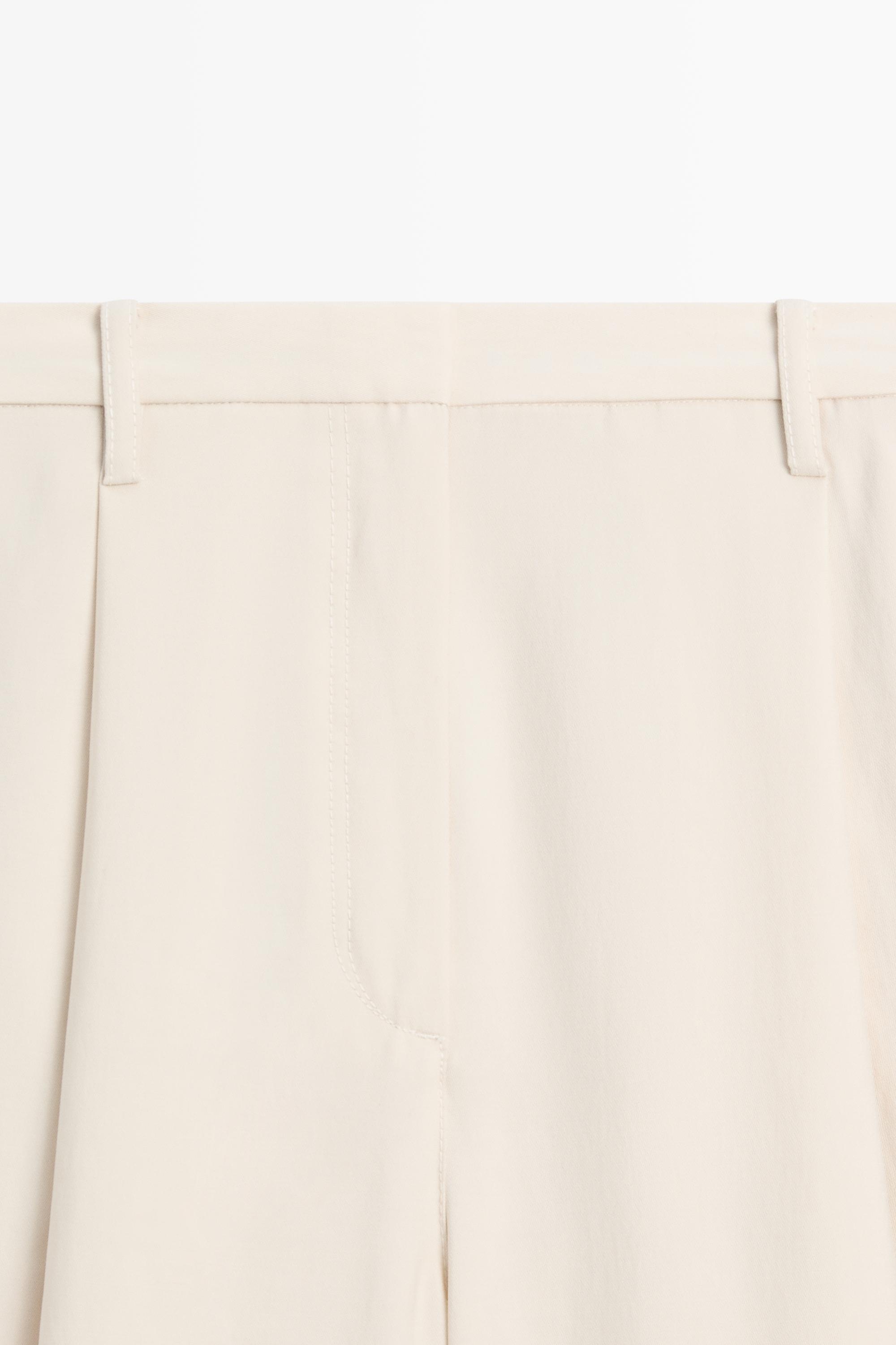 Flowing cropped wide-leg pants — CREAM