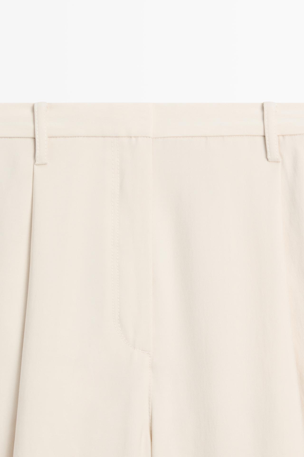 Flowing cropped wide-leg pants — CREAM