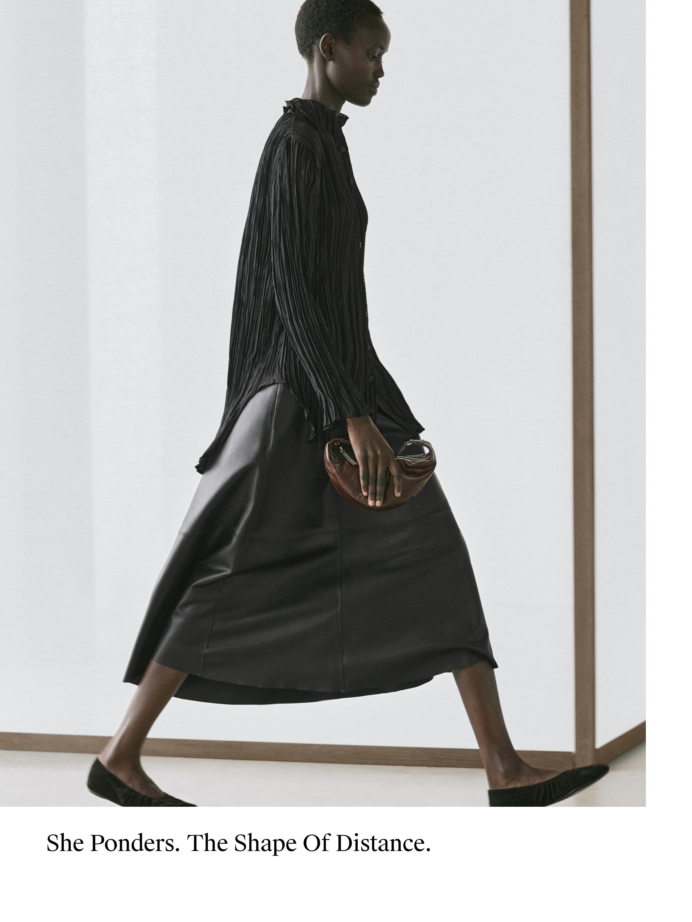 Flowing shirt with pleated detail