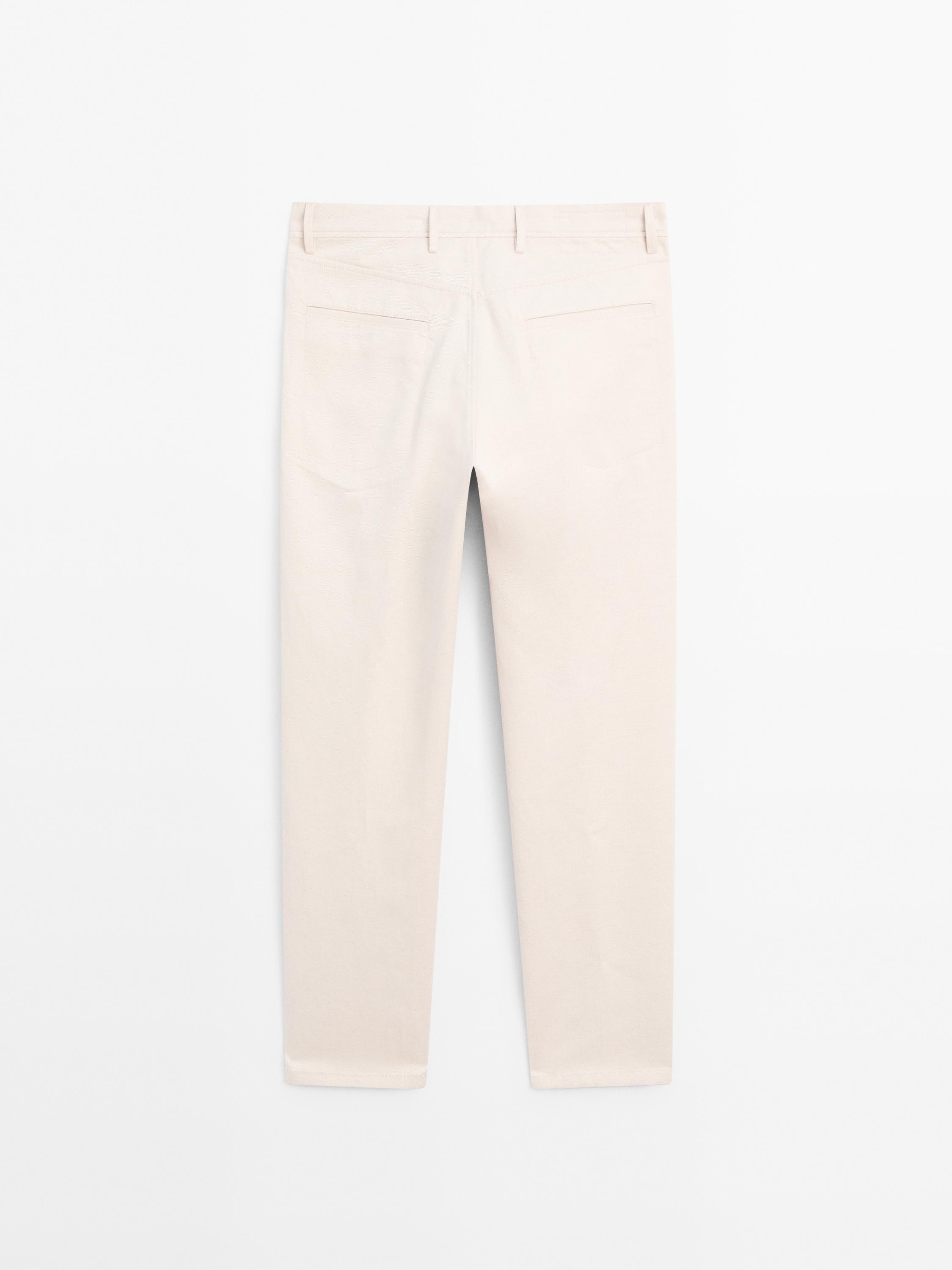 Pantalón tejanero tapered fit mezcla algodón