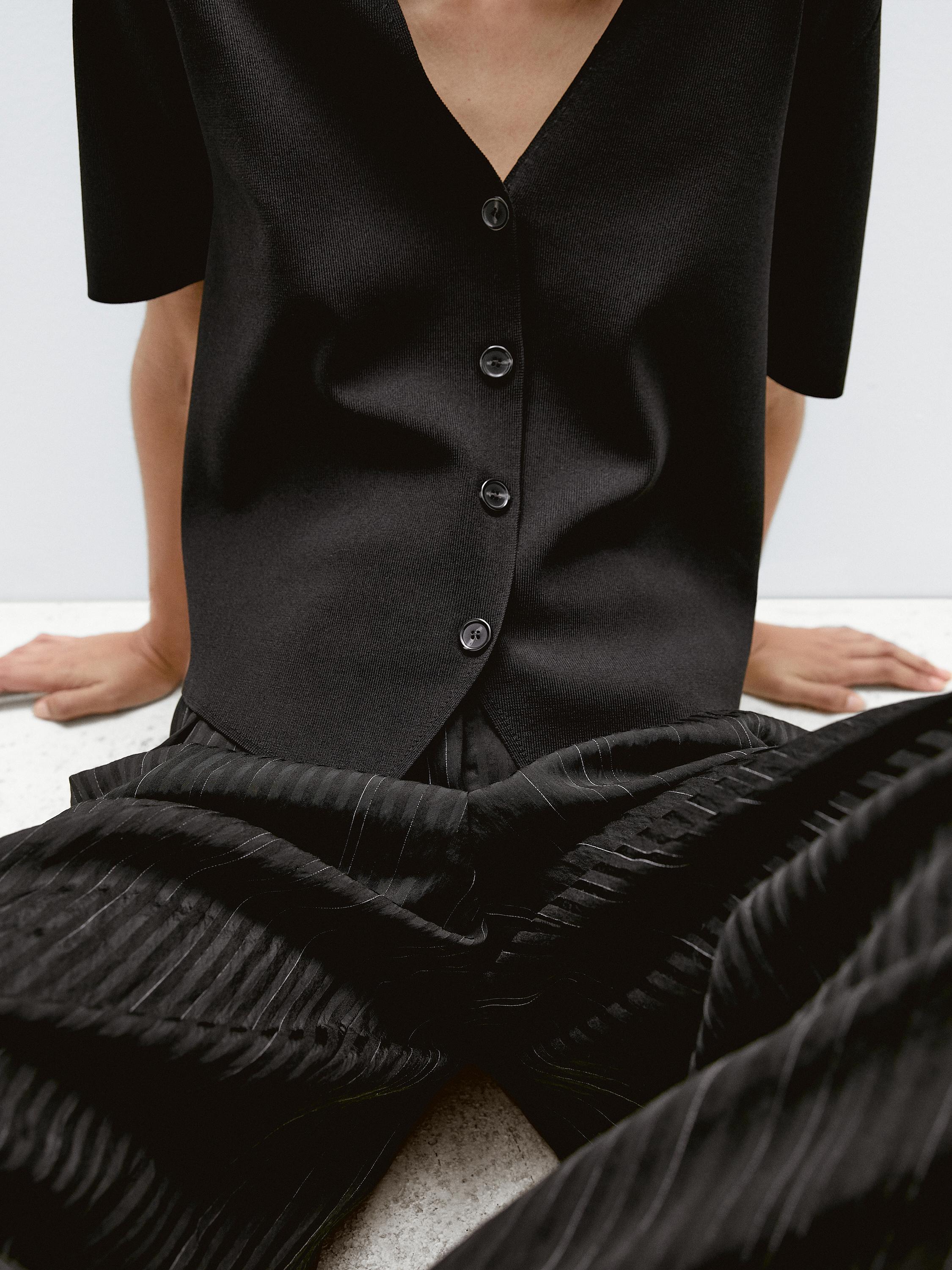 Flowing knit short sleeve cardigan