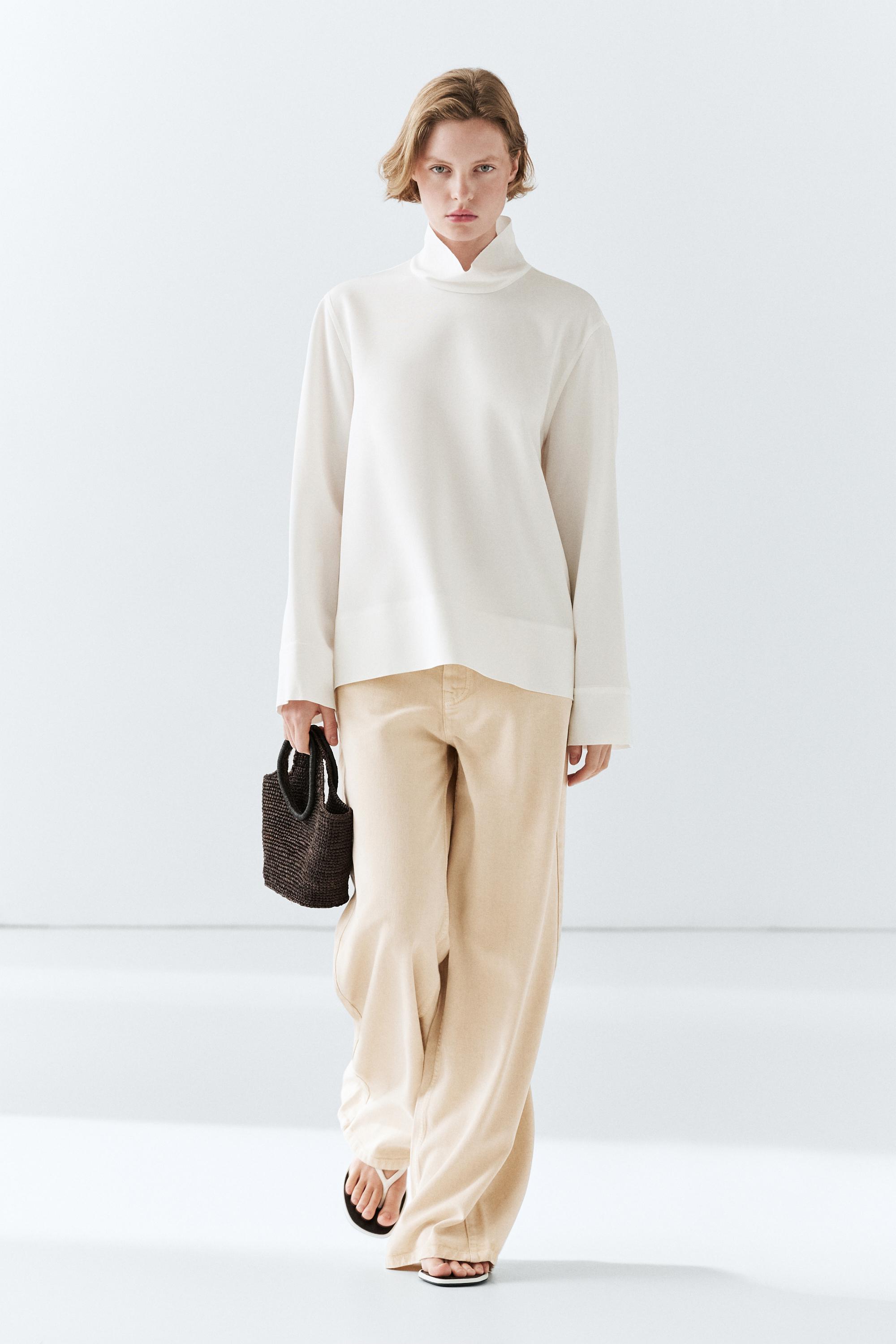 High neck blouse with hem detail — WHITE