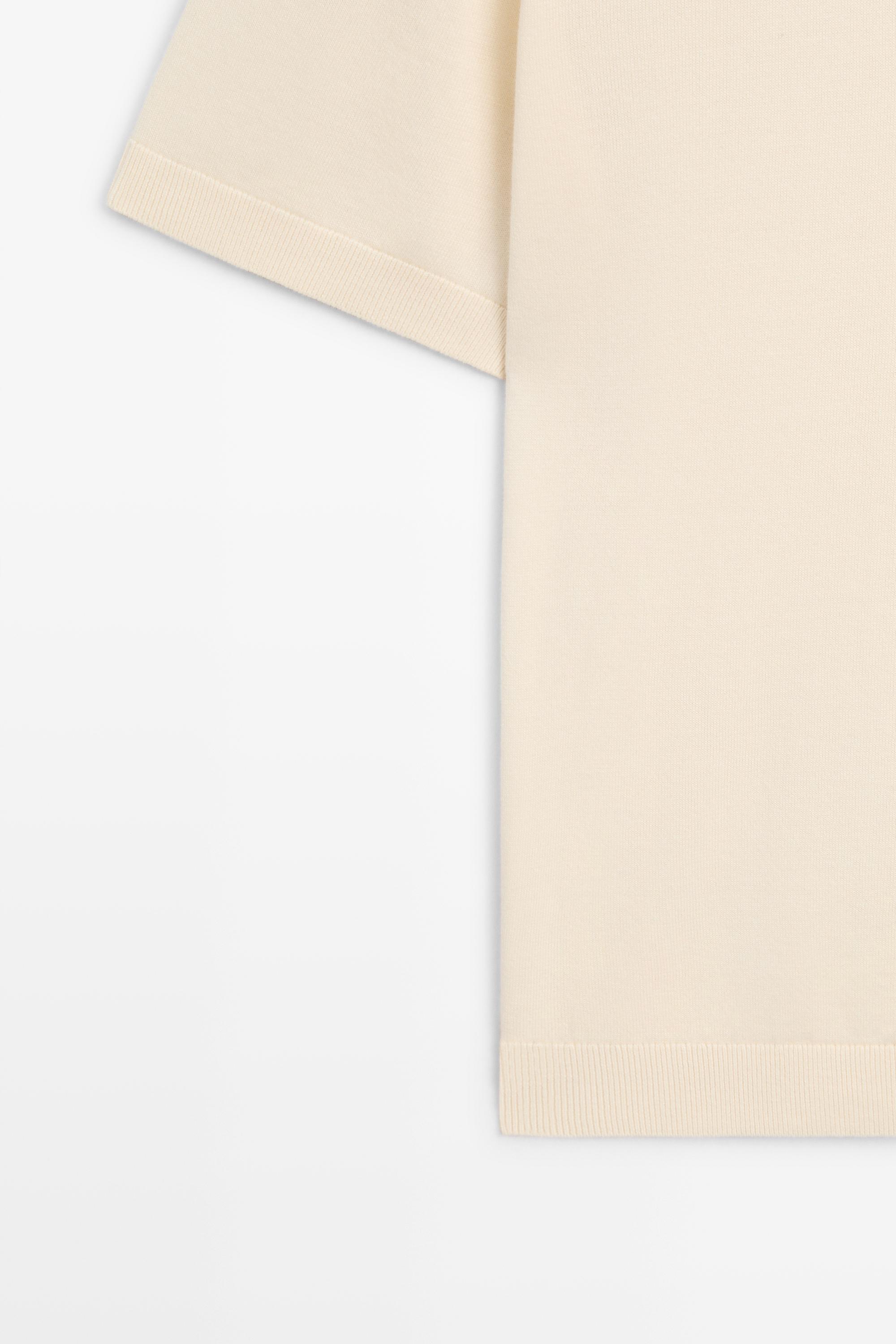 100% cotton V-neck knit polo — CREAM