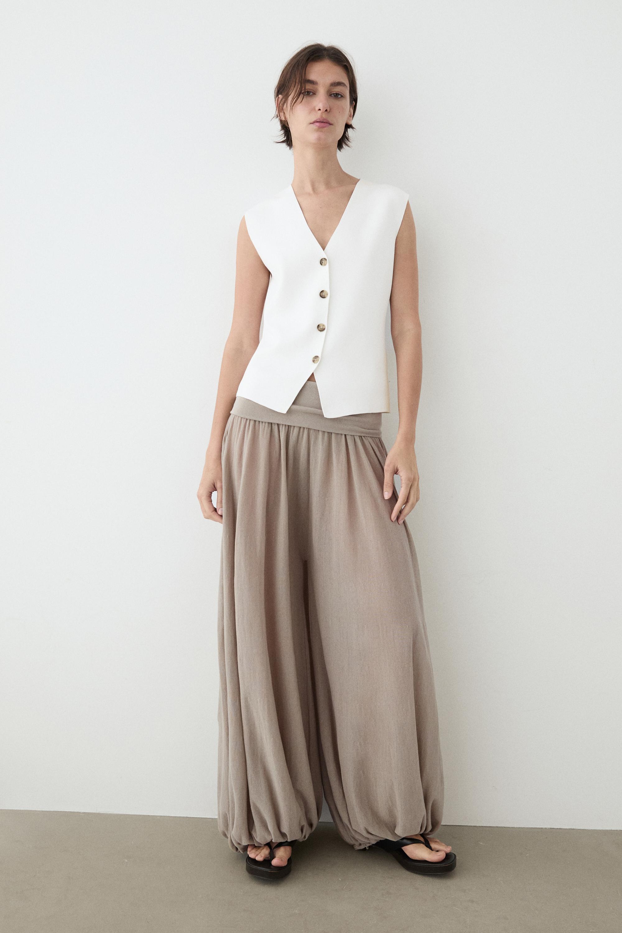 Knit waistcoat with button details — WHITE