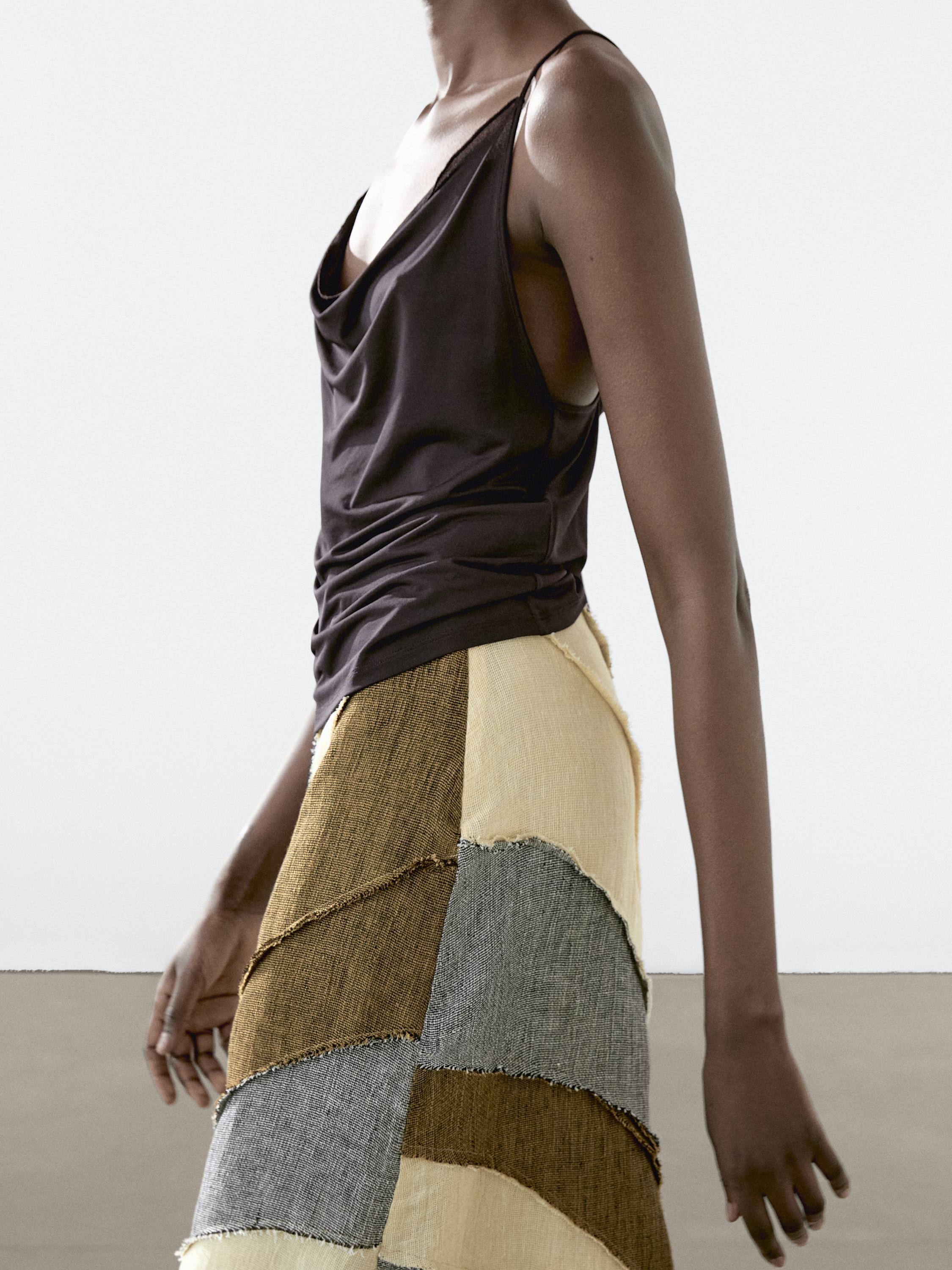 Flowing strappy top with crossover back