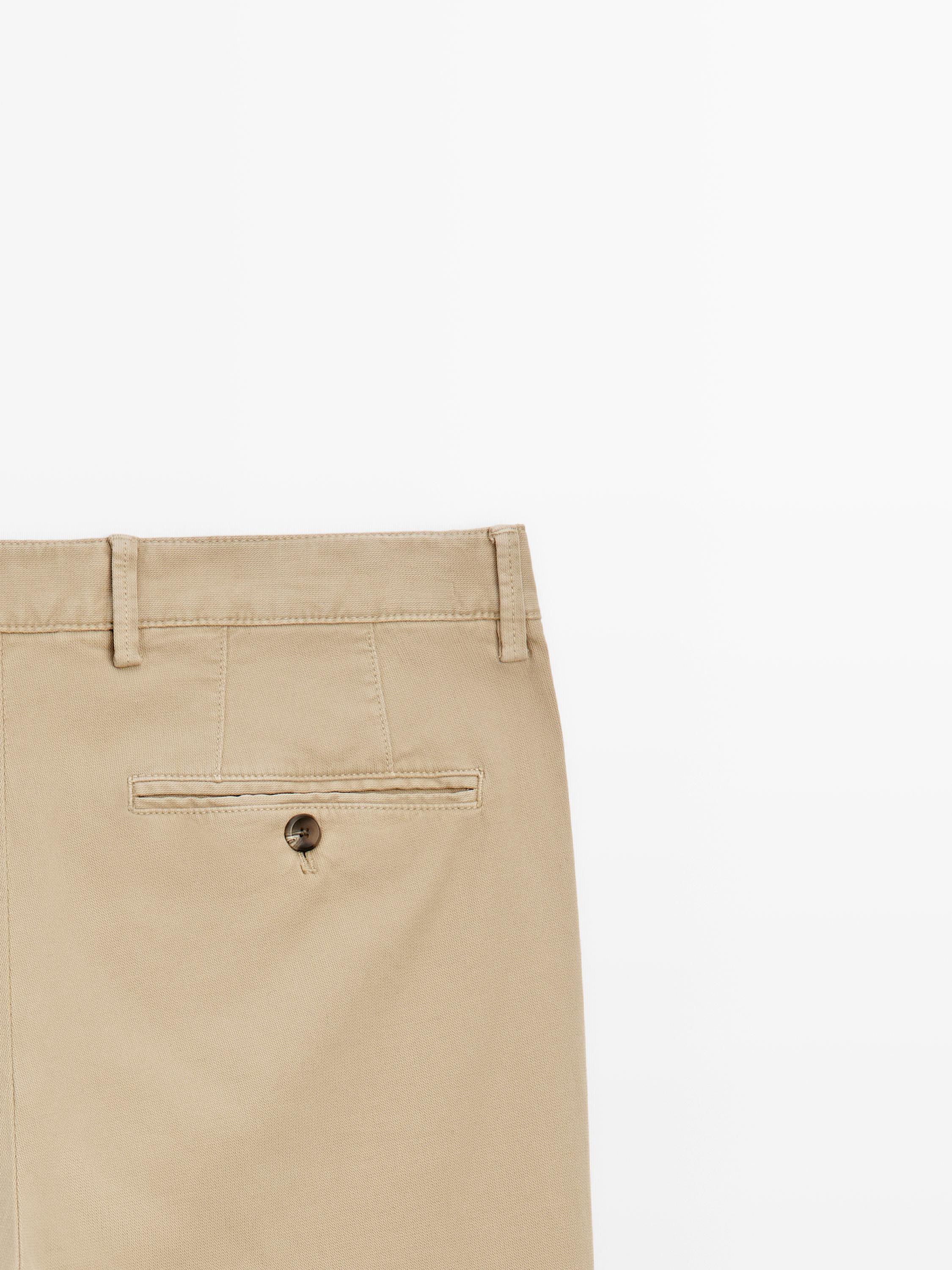 Slim-fit micro-textured trousers — OCHRE