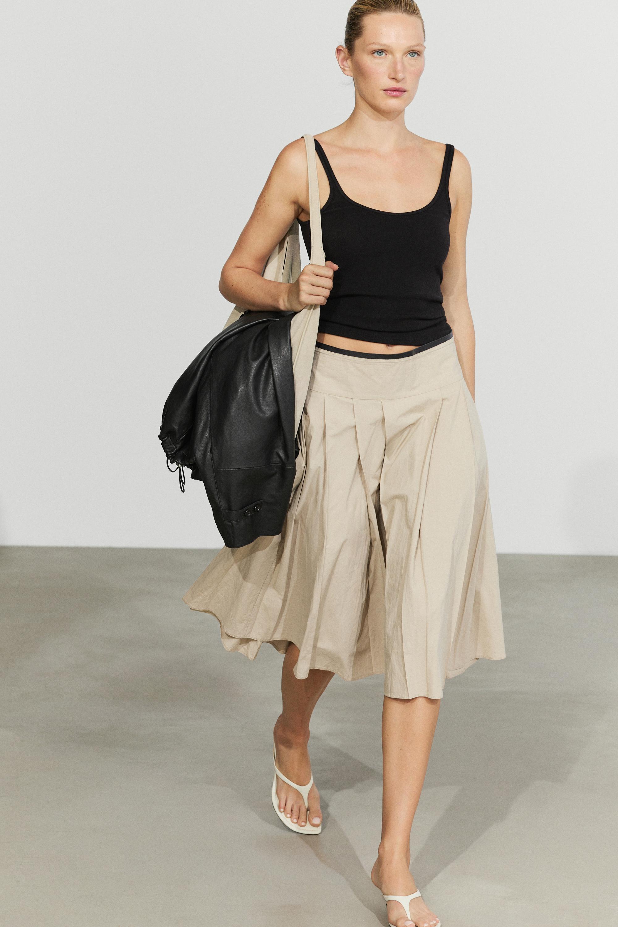 Pleated midi skirt with contrasting sash