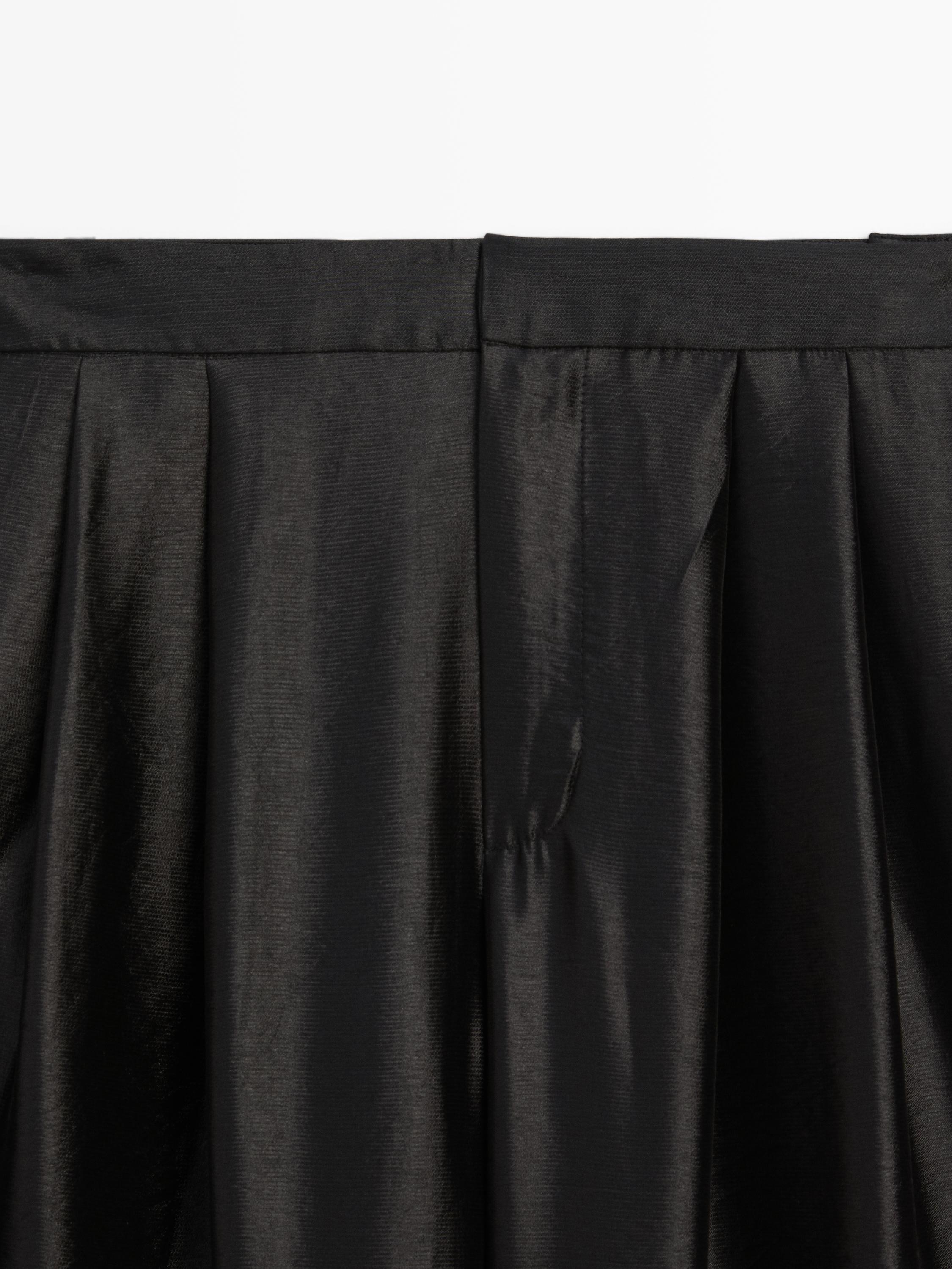 Wide-leg voluminous trousers with darts