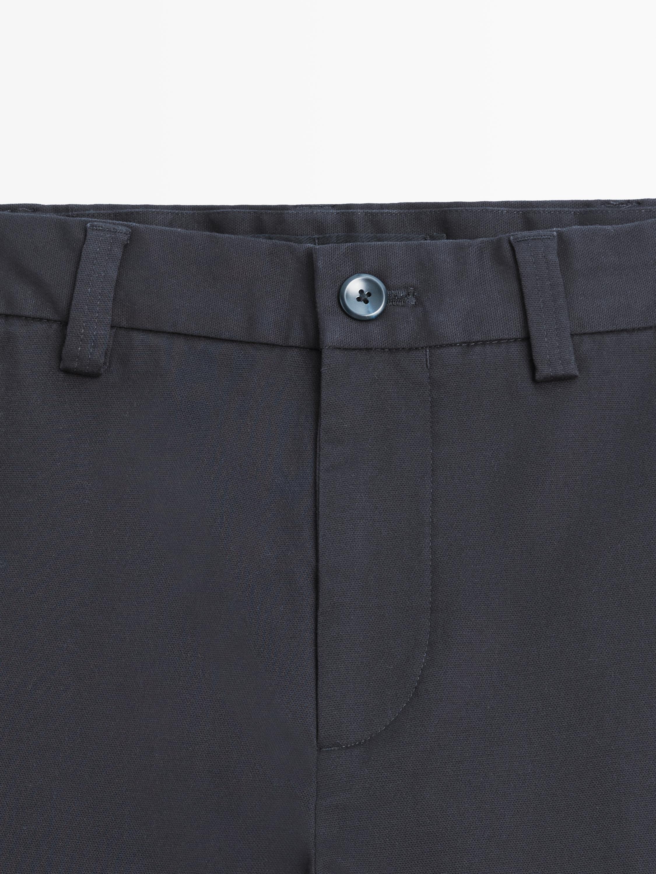 Tapered fit micro textured trousers — NAVY BLUE