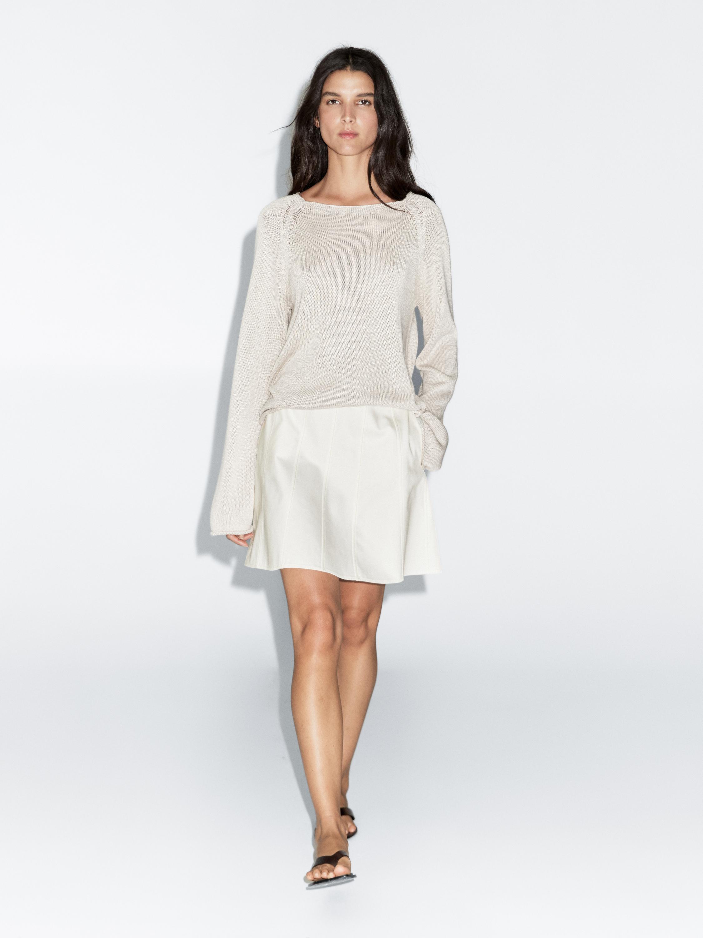 Purl knit cutwork sweater