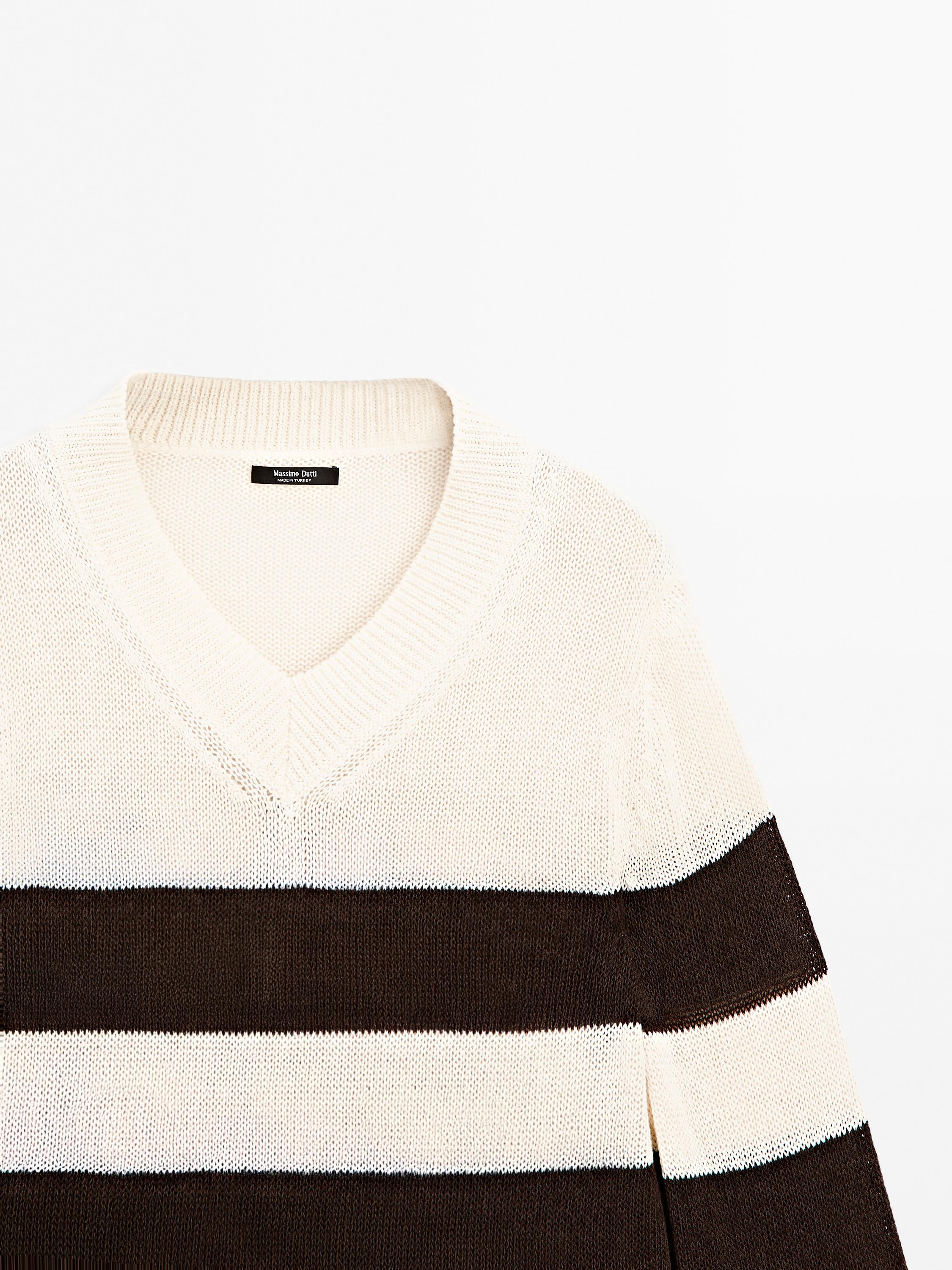 Striped cotton blend knit sweater
