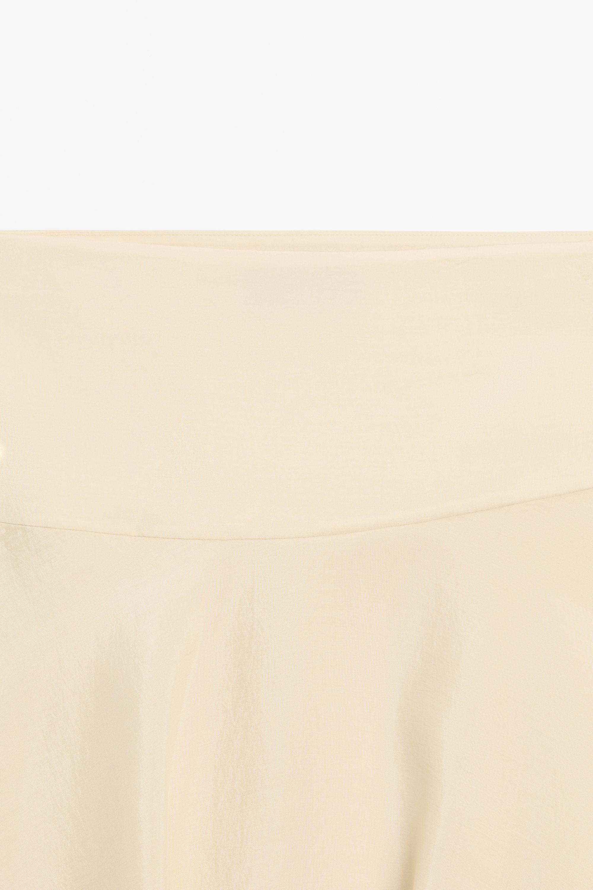 Flowing asymmetric midi skirt — Gold
