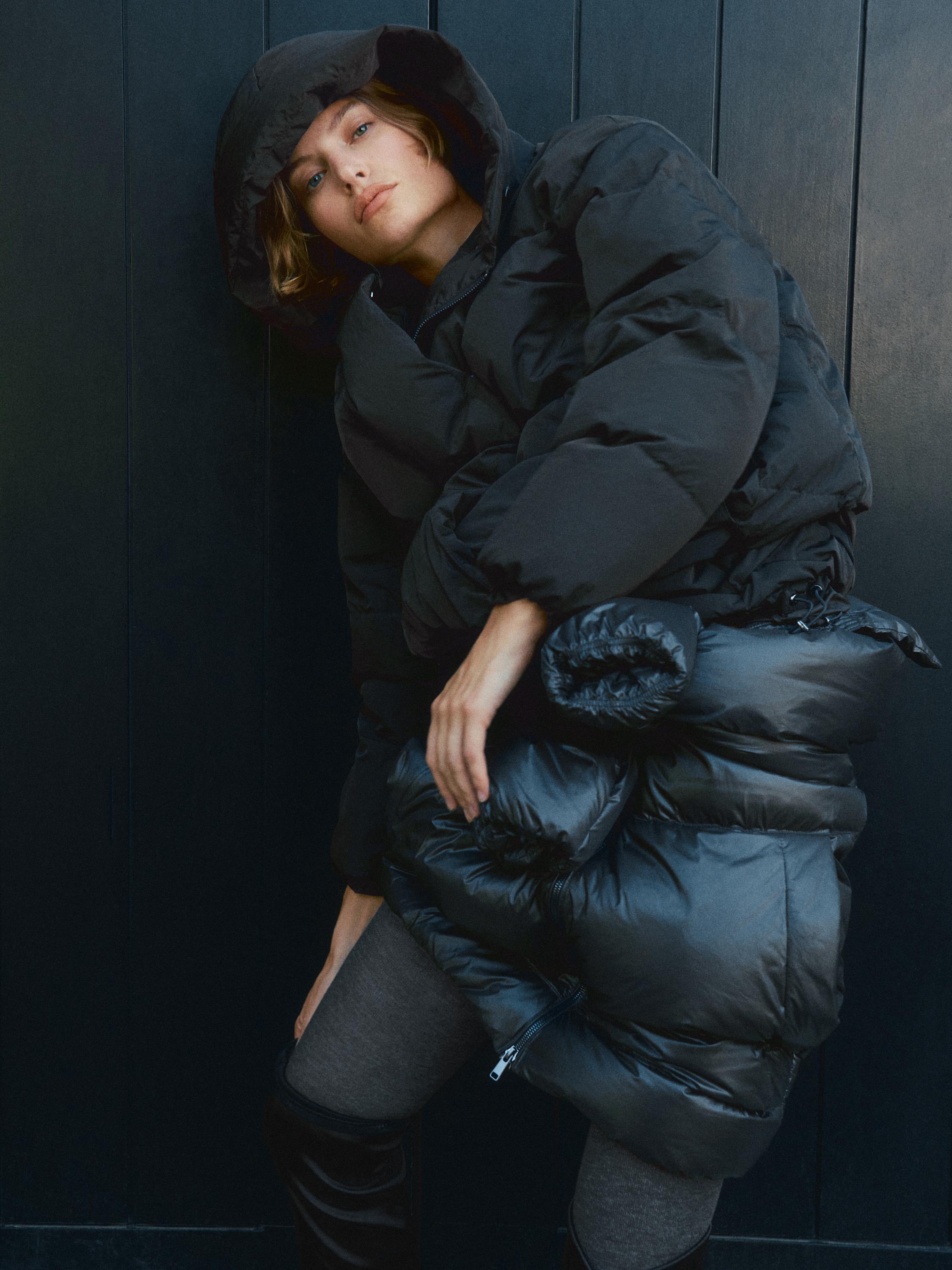 Technical down jacket with faux fur hood