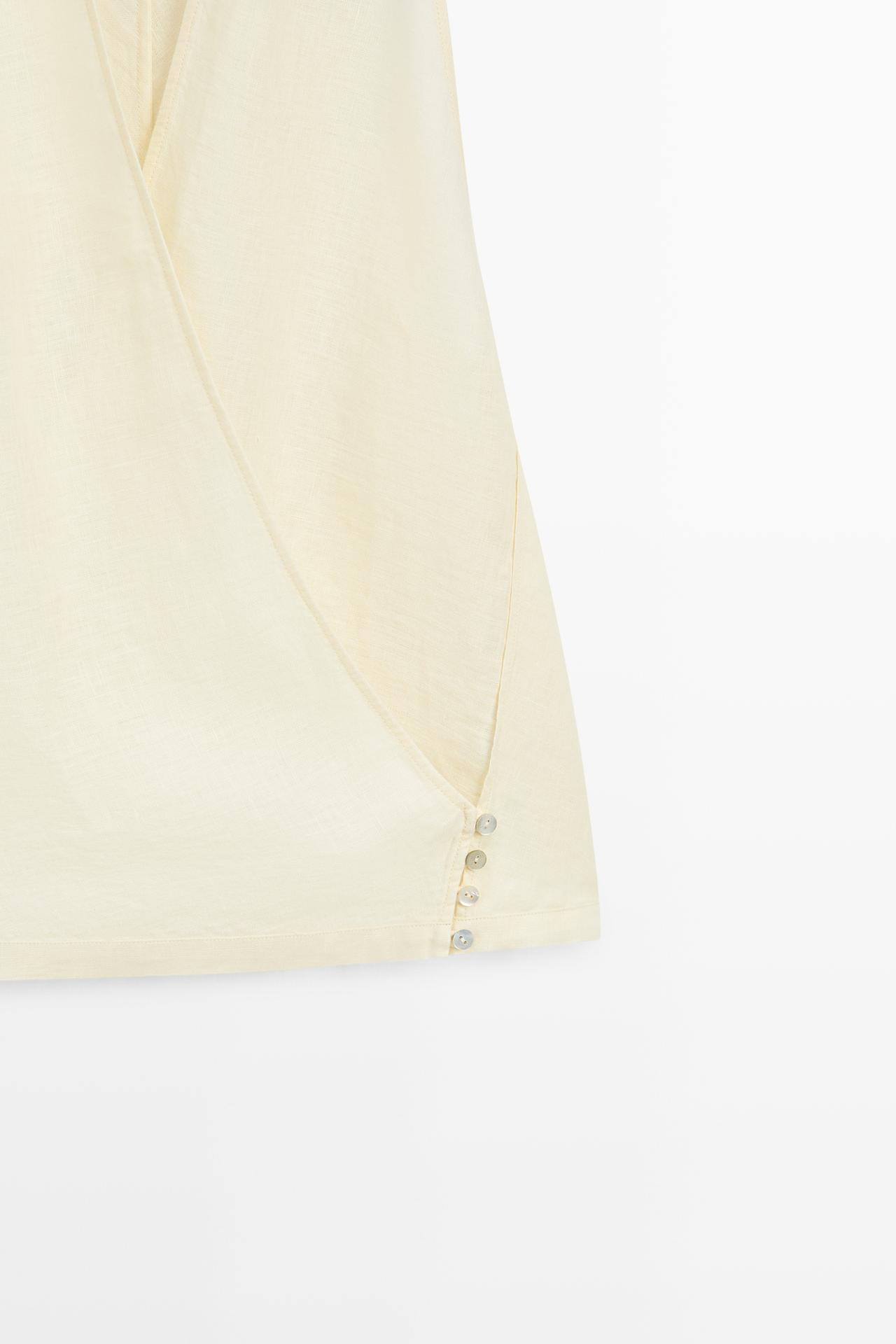 100% linen wrap top with button detail — PALE YELLOW