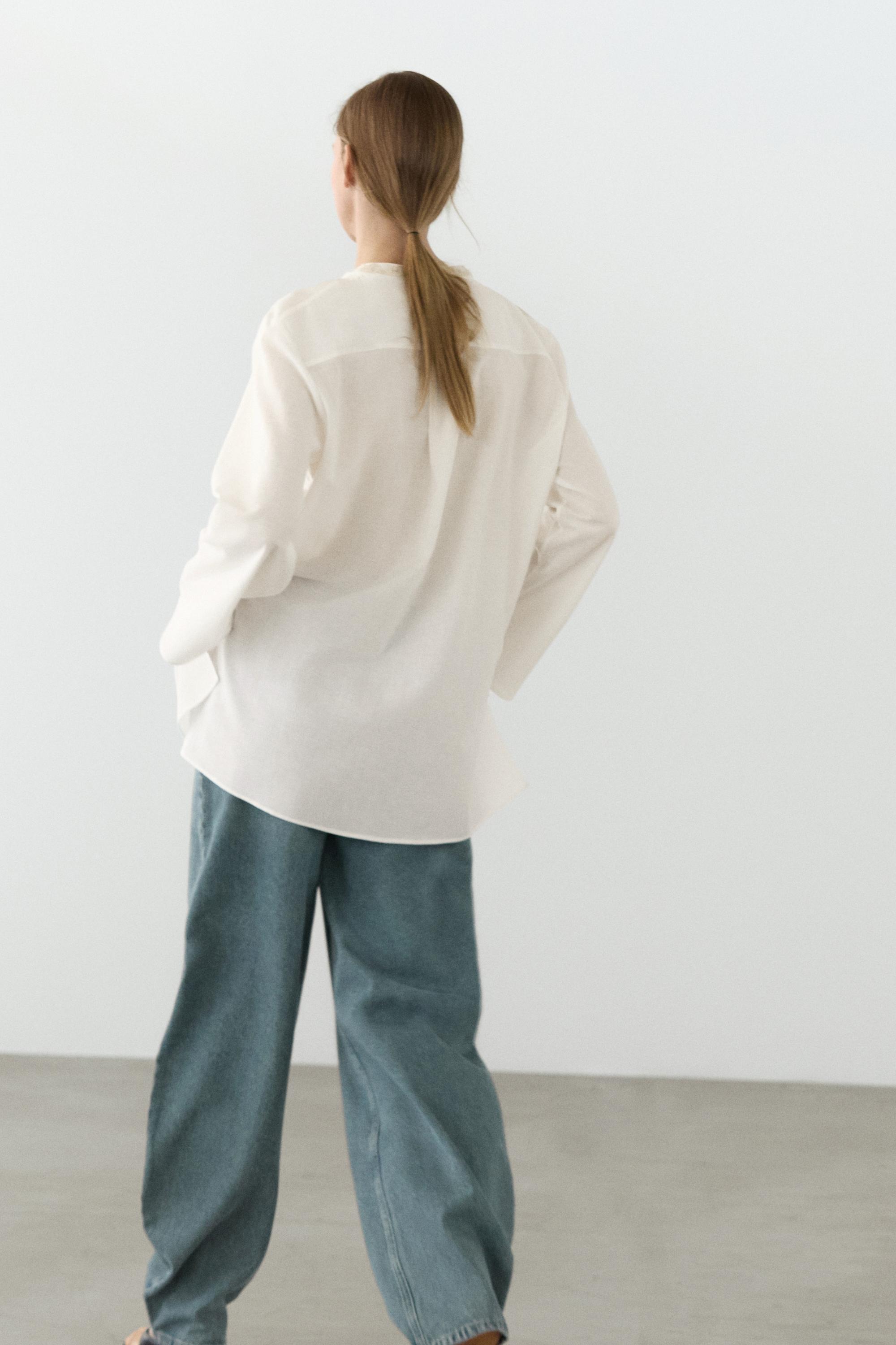 Flowing oversize blouse with stand collar and embroidery — CREAM