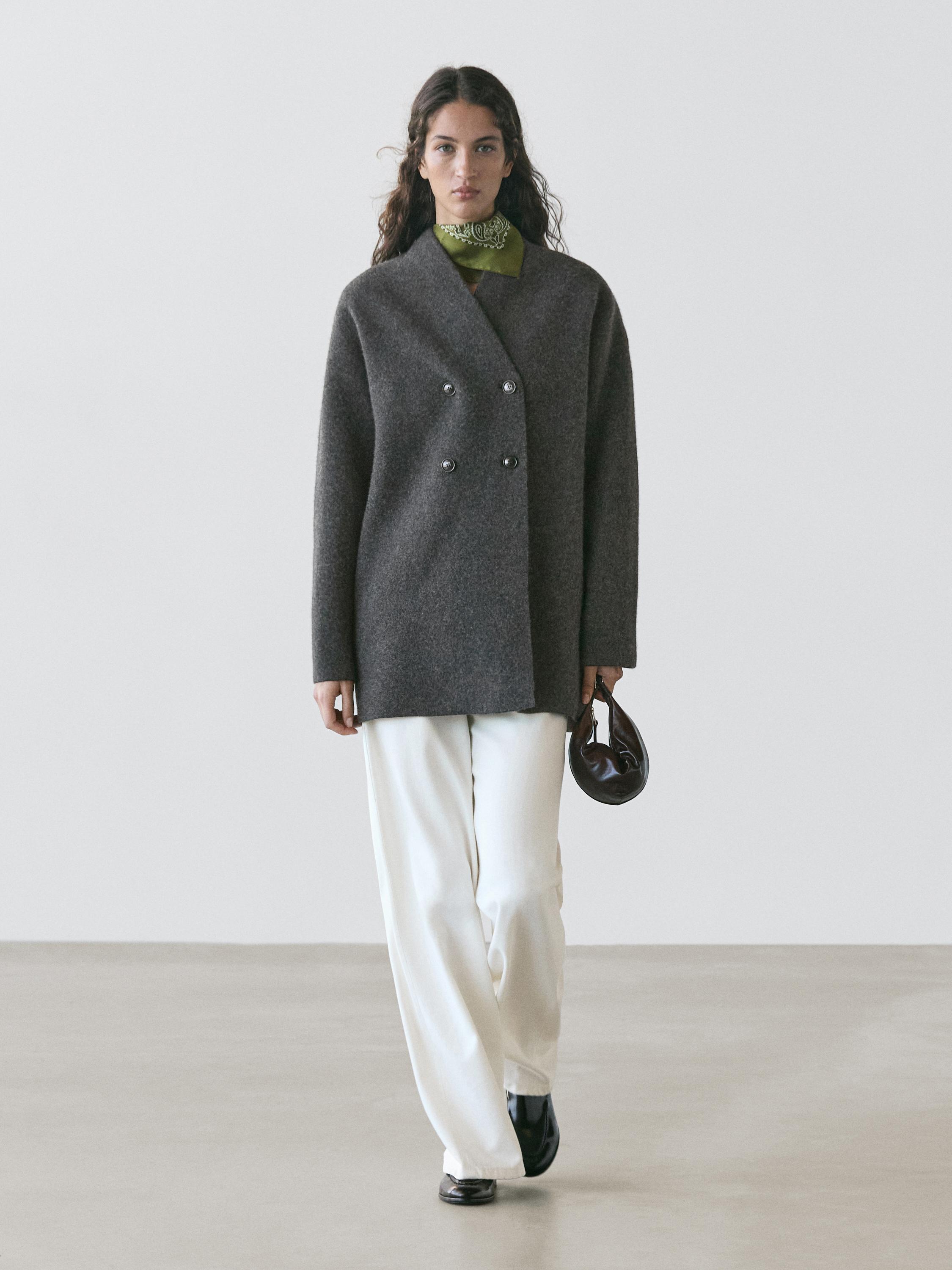 Áo khoác dài giữa hai bên ngực 100% len