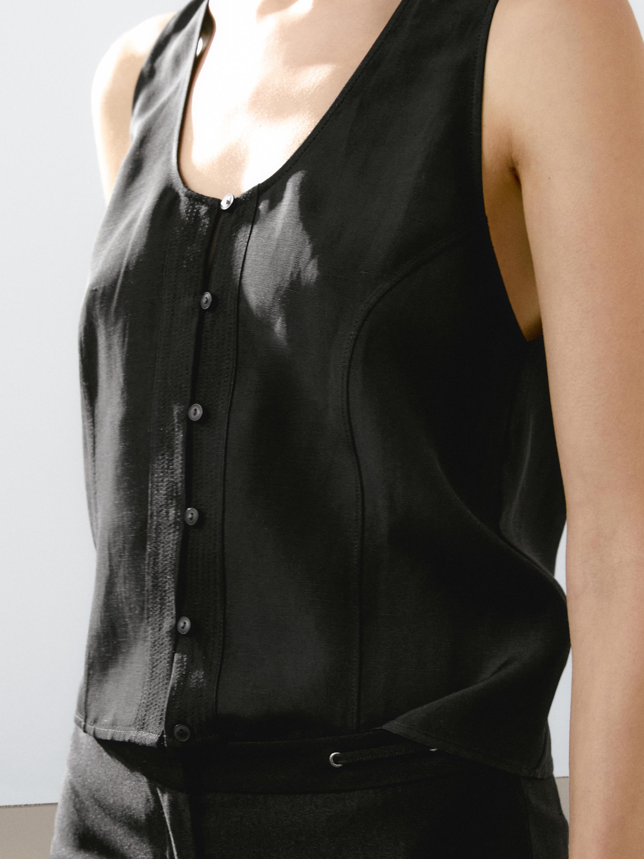 Top abotonado pespunte pechera