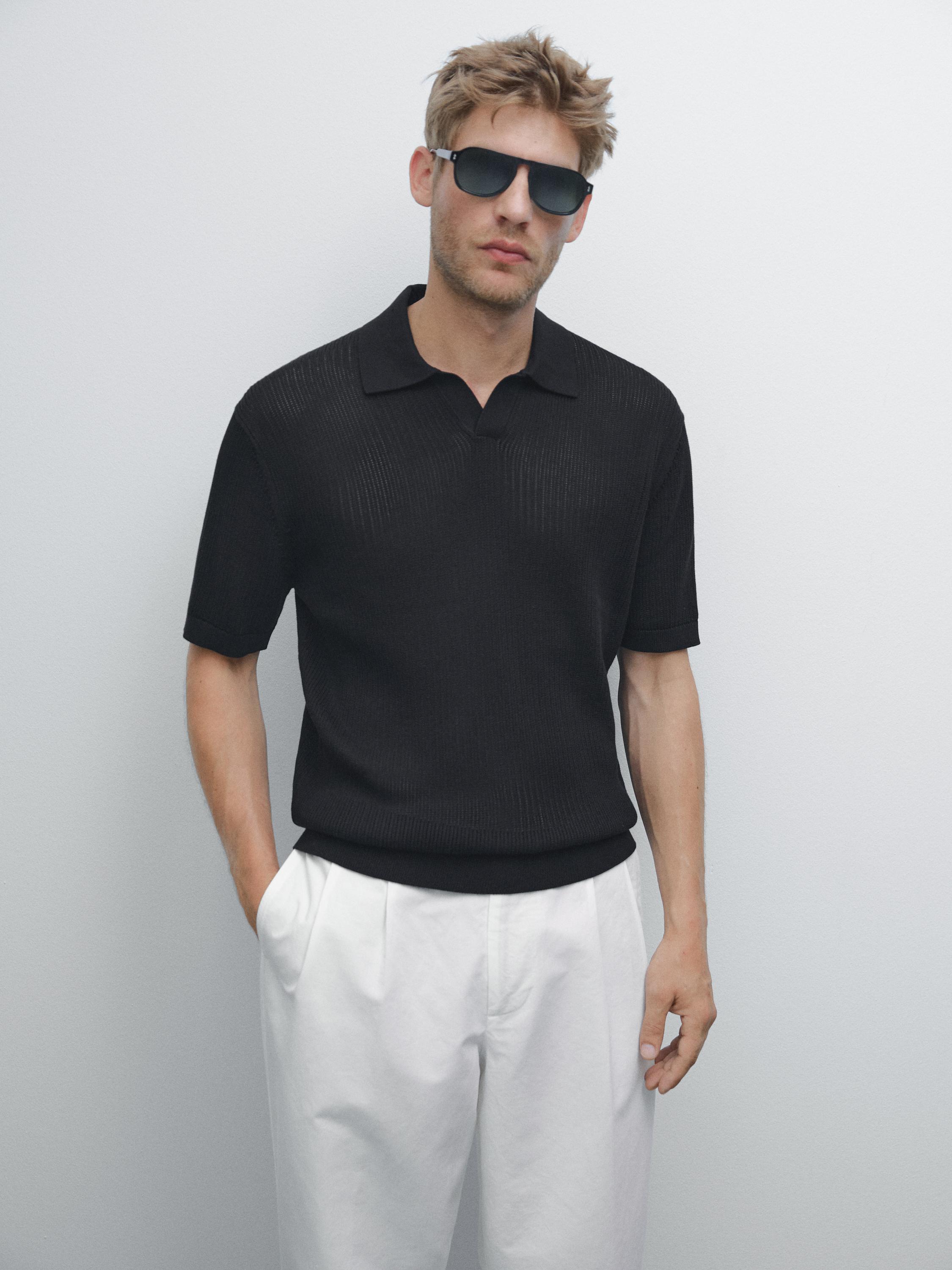 Polo in maglia con scollo a v traforato