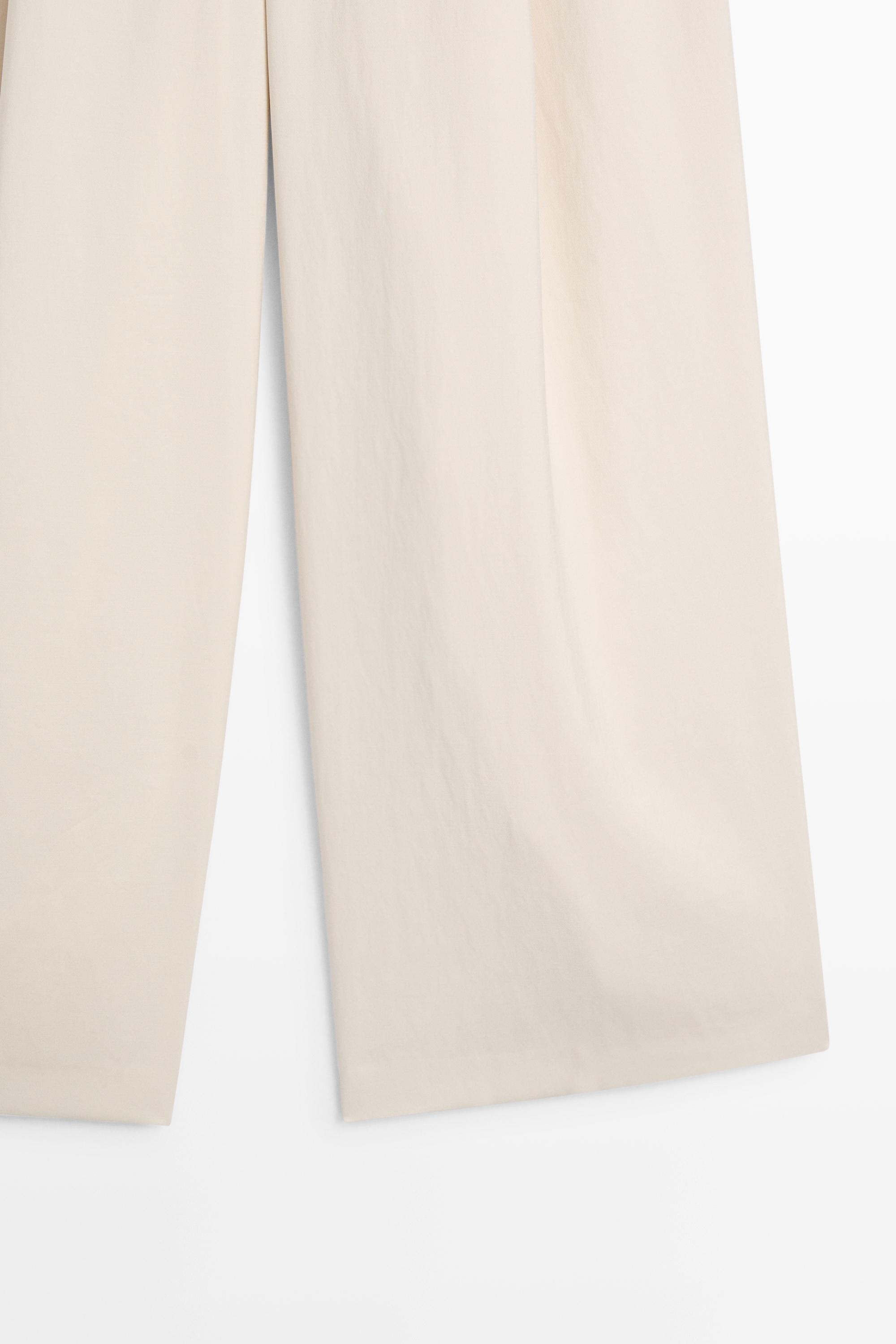 Flowing cropped wide-leg pants — CREAM