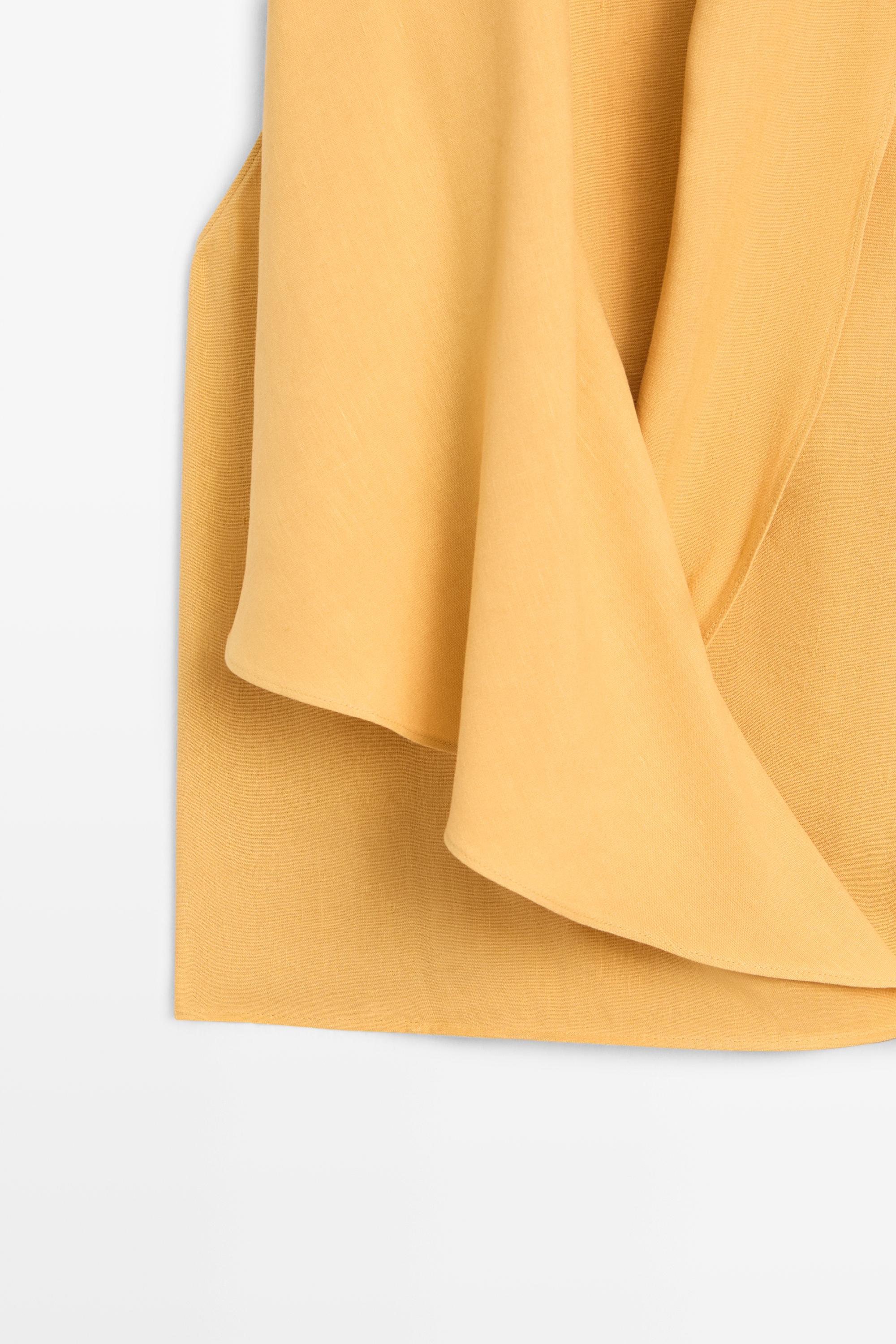 Flowing halter top with ruffle detail — YELLOW