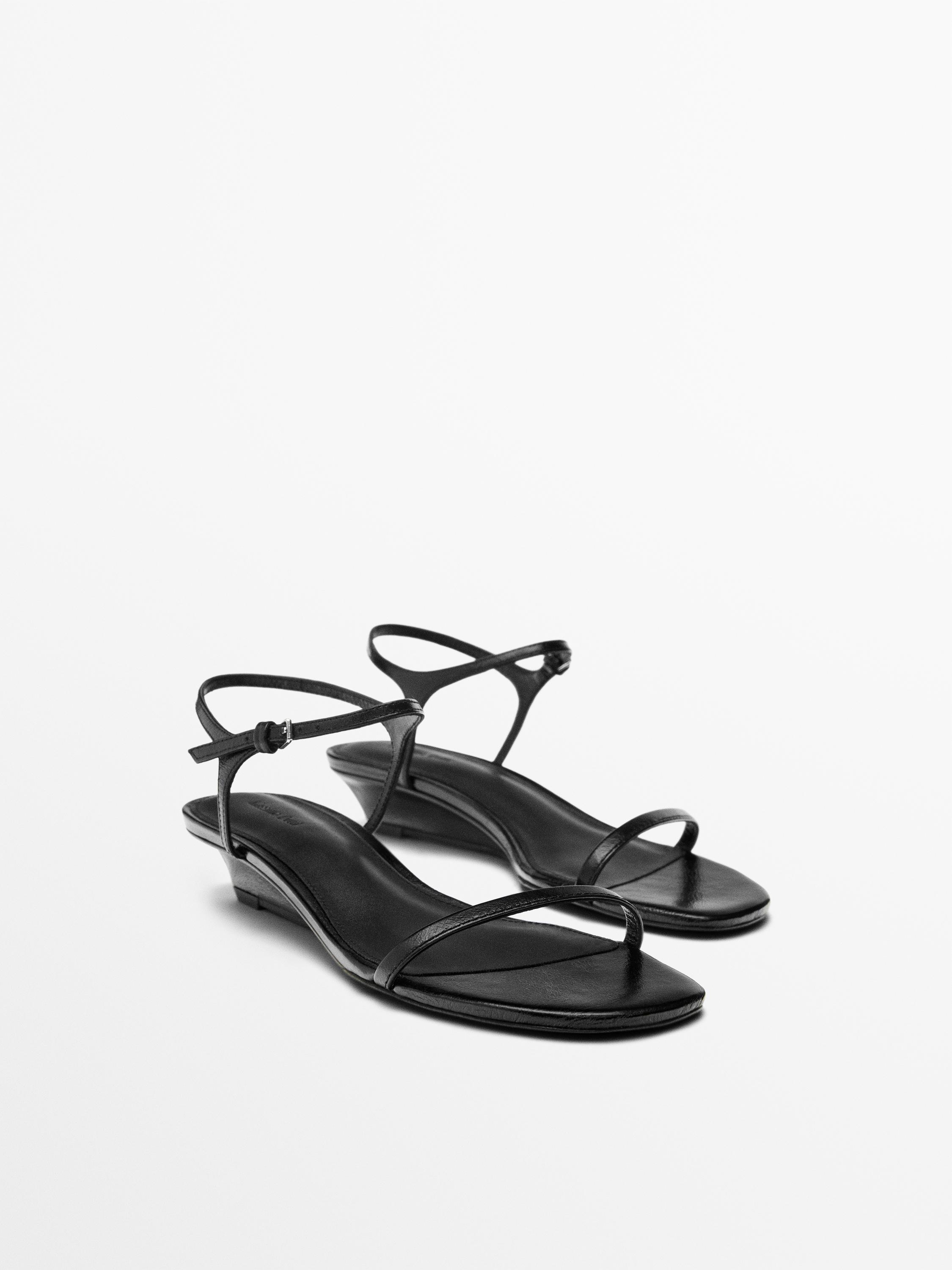 Sandalia piel tiras cuña media