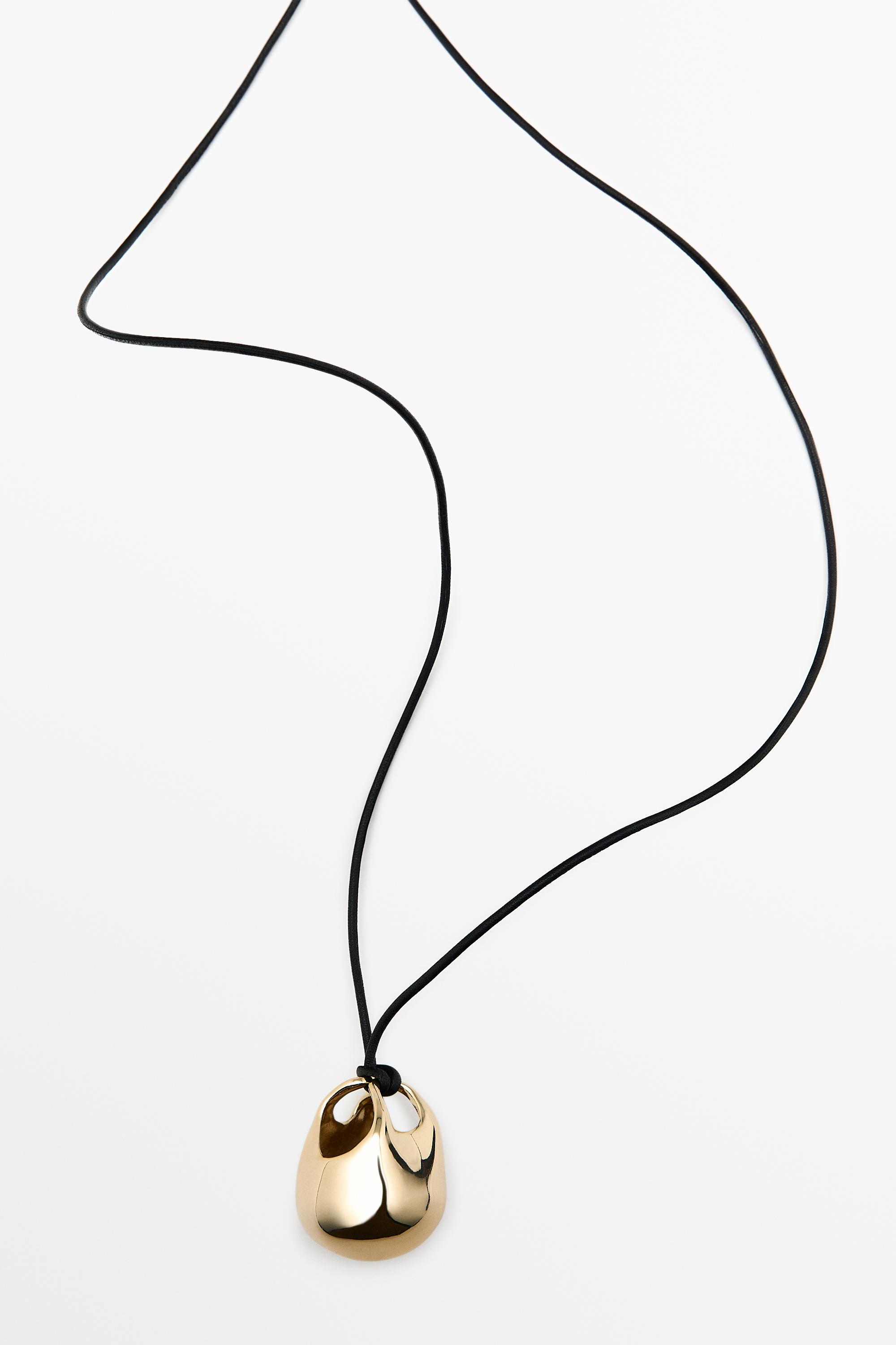 Oval bag pendant necklace — GOLDEN