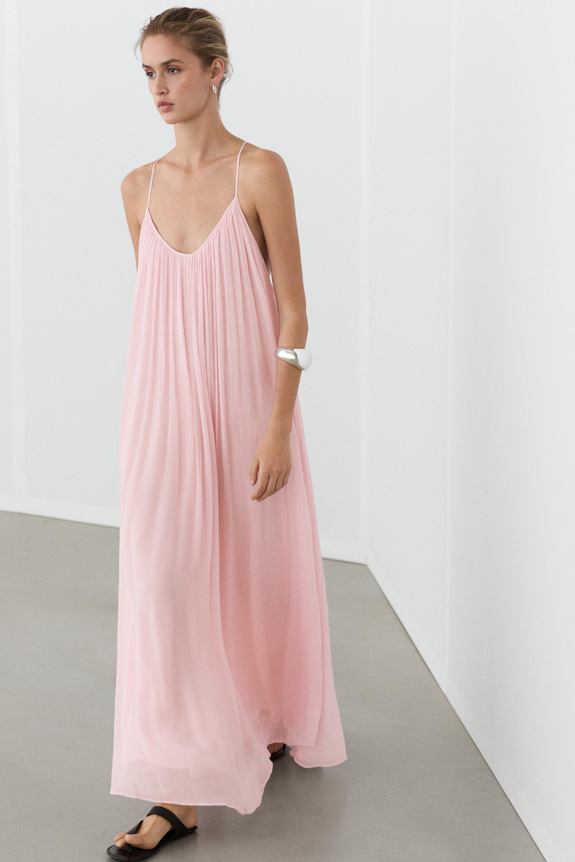 Flowing pleated spaghetti strap dress