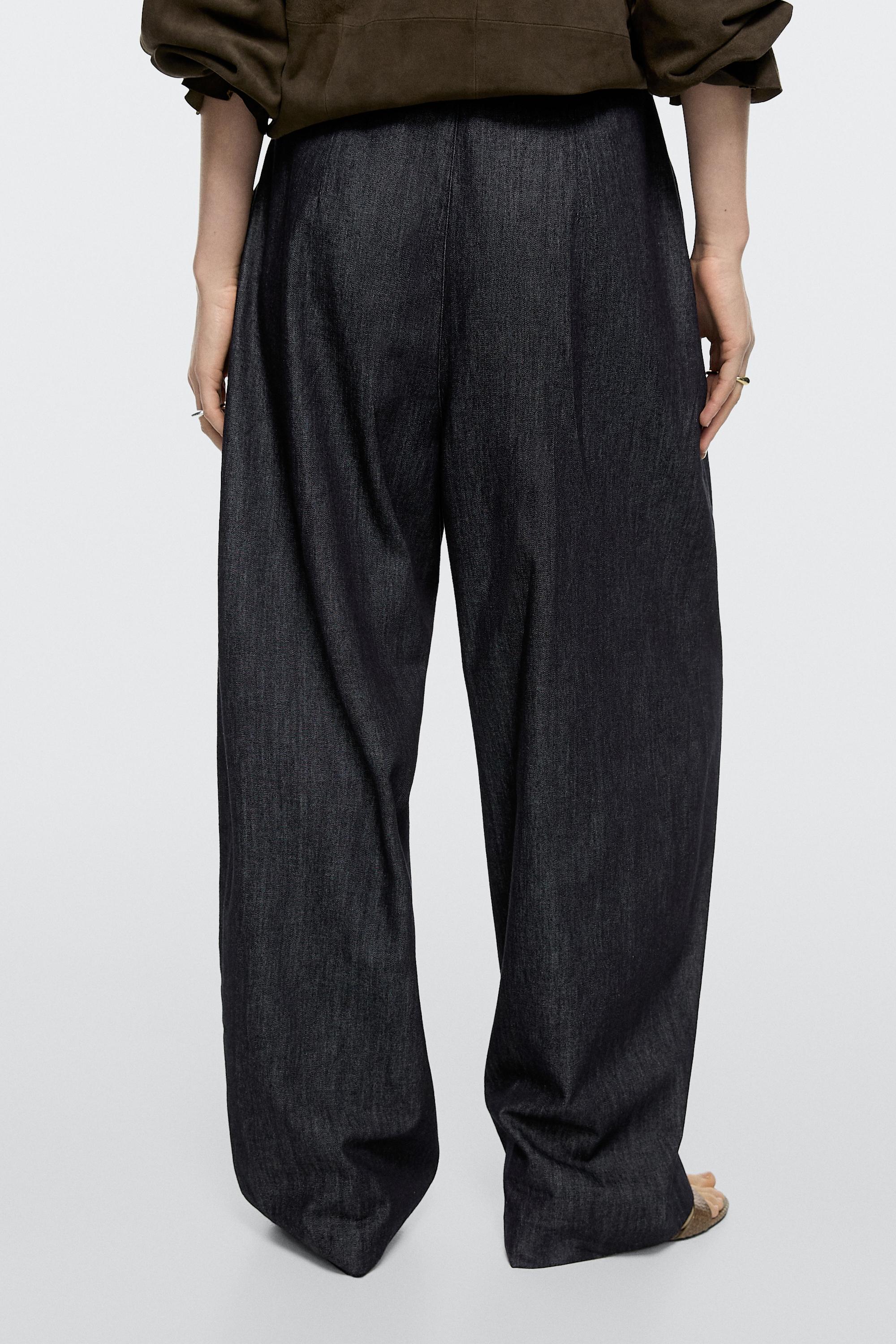 High-waist pants with crossover detail — DARK BLUE